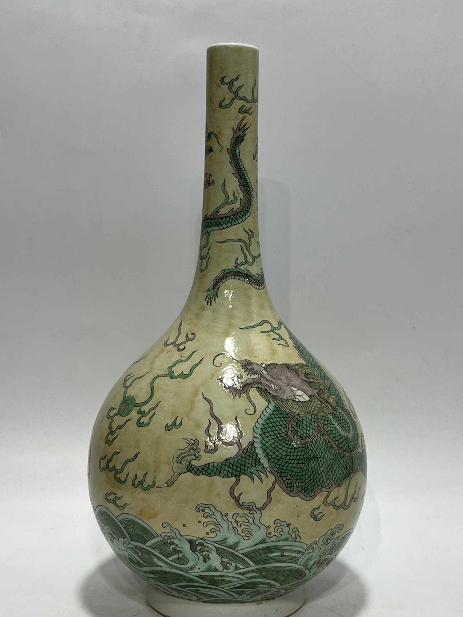 An Exquisite Biscuit Seawater and Dragon Pattern Vase: An Exquisite Biscuit Seawater and Dragon Pattern Vase,Qing Dynasty,China,Kangxi Six-character Mark,Size:16.5in 素三彩海水龙纹瓶,中国清
