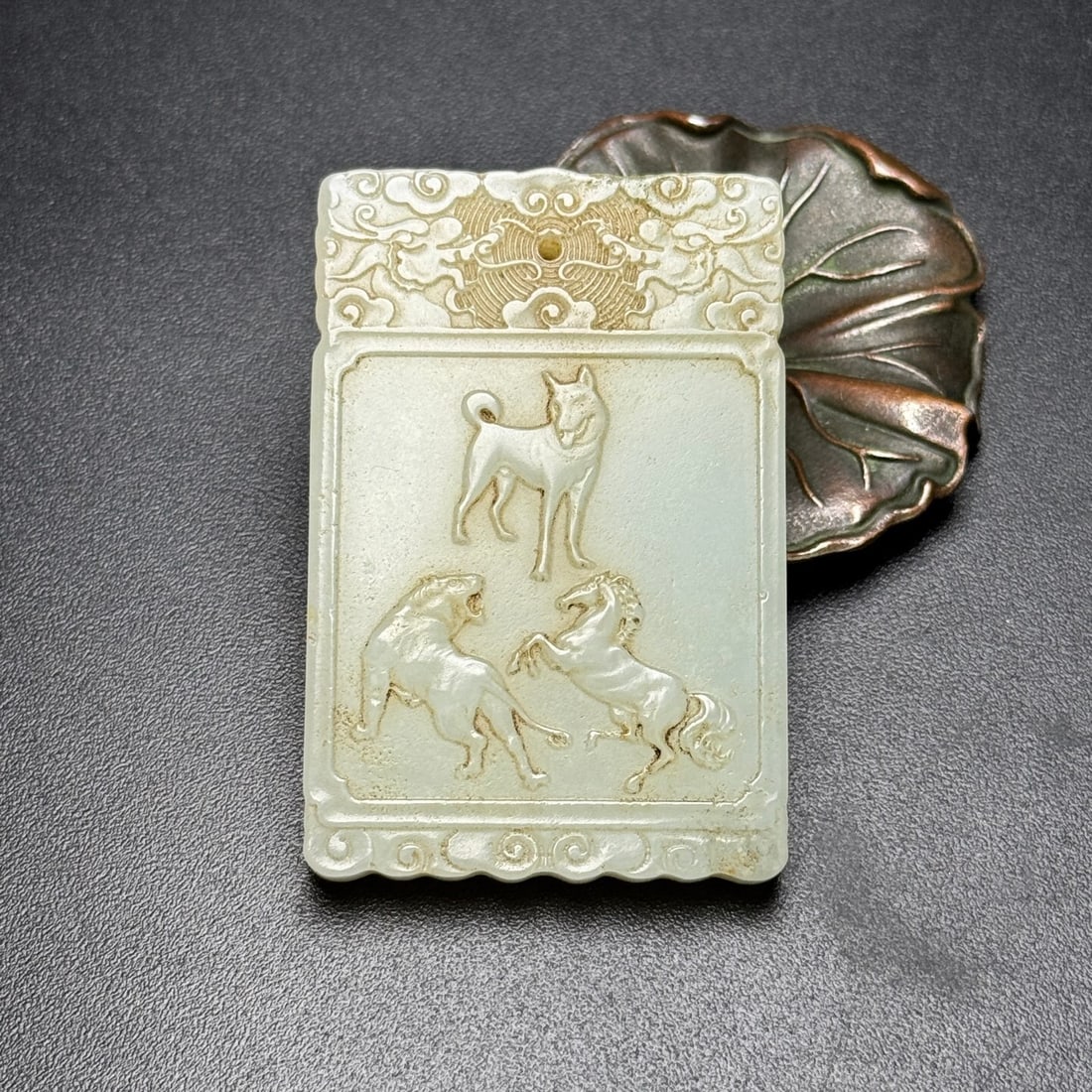 An Exquisite White Jade Animal Pattern Pendant,with poem: An Exquisite White Jade Animal Pattern Pendant,with poem,Qing Dynasty,China,Size:60mmx39mmx6mm,Weight:40g 白玉动物纹挂件,带诗文,中