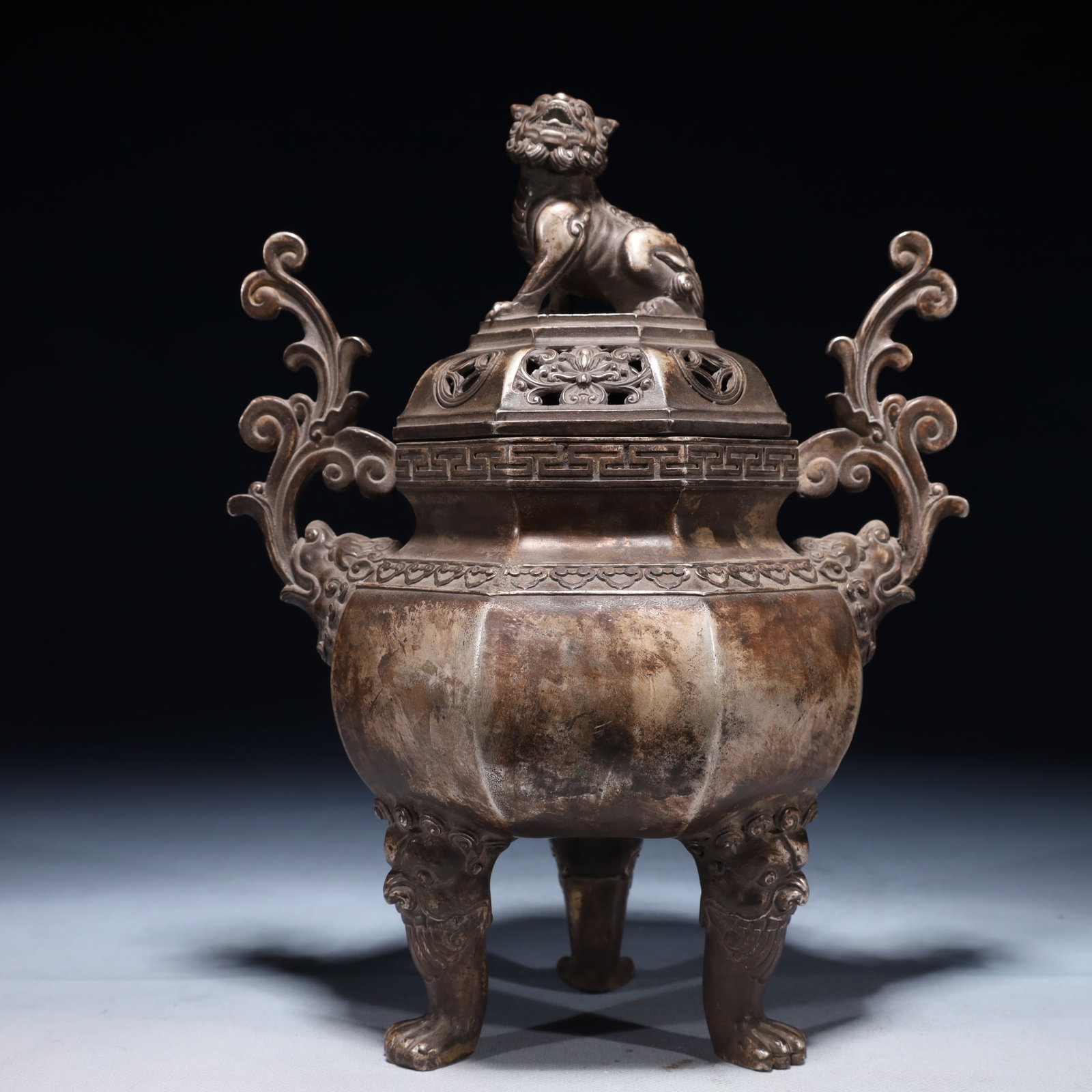 An Exquisite Silver-plated Bronze Lotus Pattern Double-Ears and Tripod Censer: An Exquisite Silver-plated Bronze Lotus Pattern Double-Ears and Tripod Censer,Ming Dynasty,China,Xuande Four-character Mark,Size:8.3inx5.1inx10.2in,Weight:1650g 铜镀银缠枝