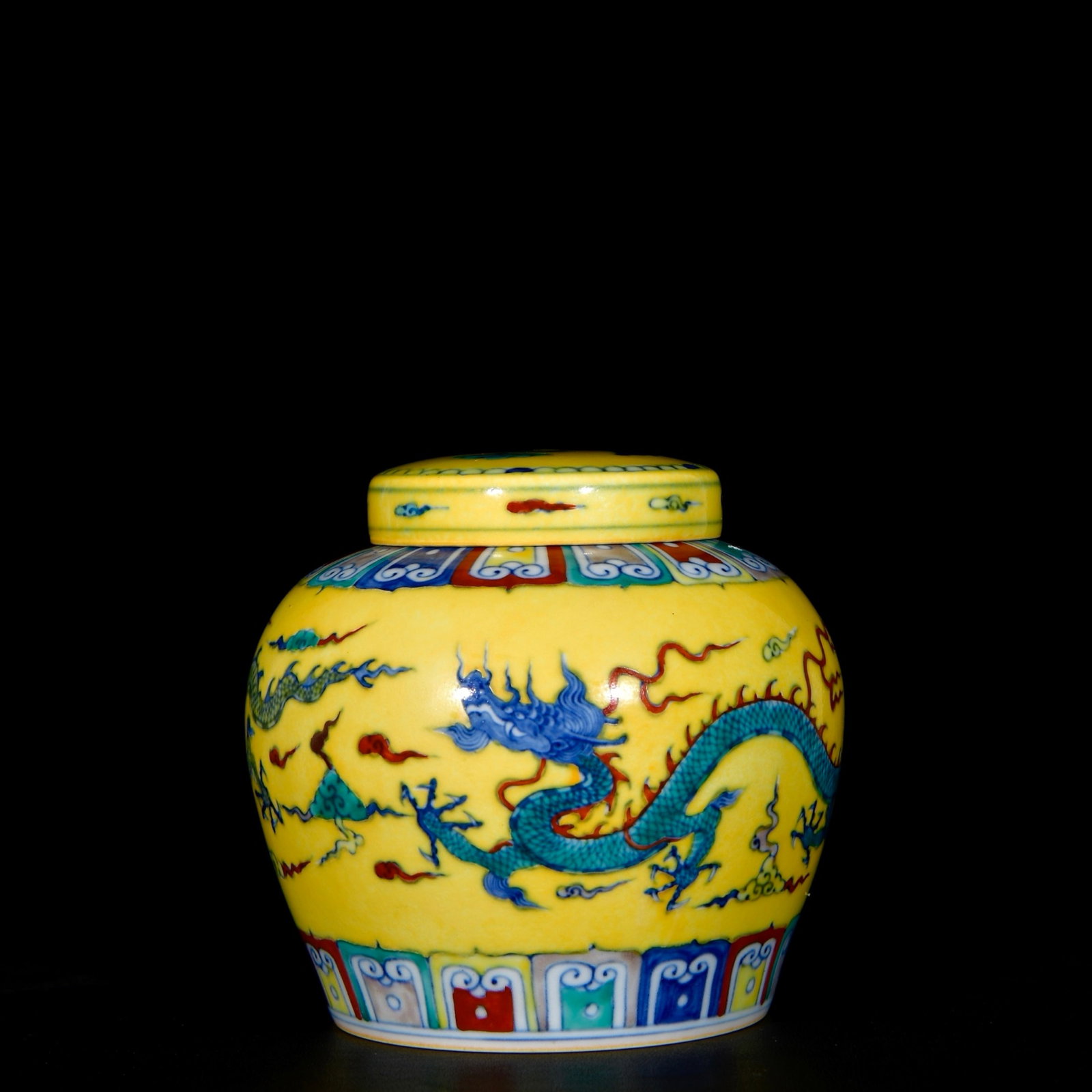 An Exquisite Yellow Ground Doucai Auspicious Cloud and Dragon Pattern Jar with Cover: An Exquisite Yellow Ground Doucai Auspicious Cloud and Dragon Pattern Jar with Cover,Ming Dynasty, China,Size:5.1inx5.9in 黄地斗彩祥云龙纹盖಻