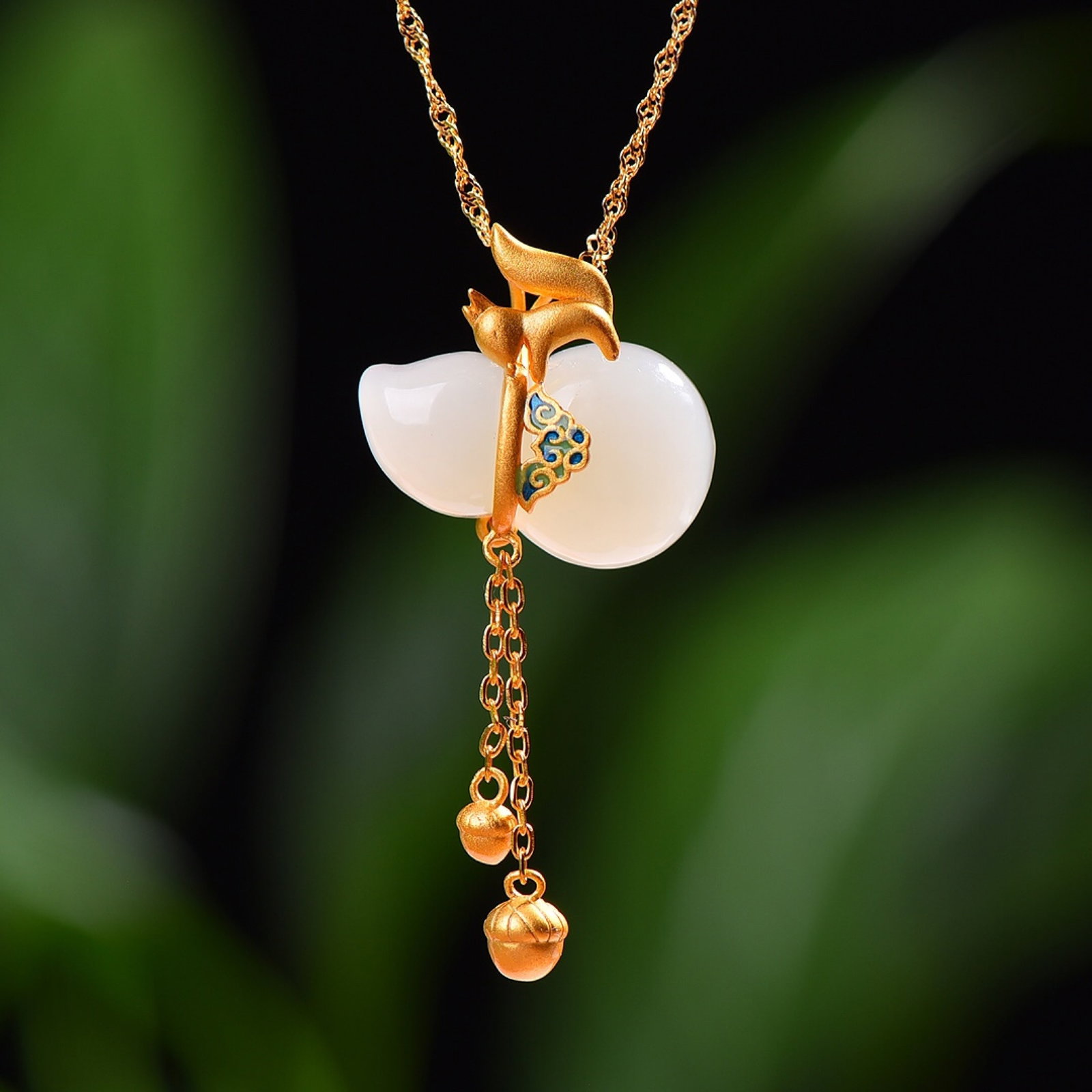 An Exquisite Sterling Silver-Gold Plated Inlaid White Jade Enamel Gourd Pendant: An Exquisite Sterling Silver-Gold Plated Inlaid White Jade Enamel Gourd Pendant,Size:14mmx22mm 纯银镀金镶白玉珐琅葫芦吊坠