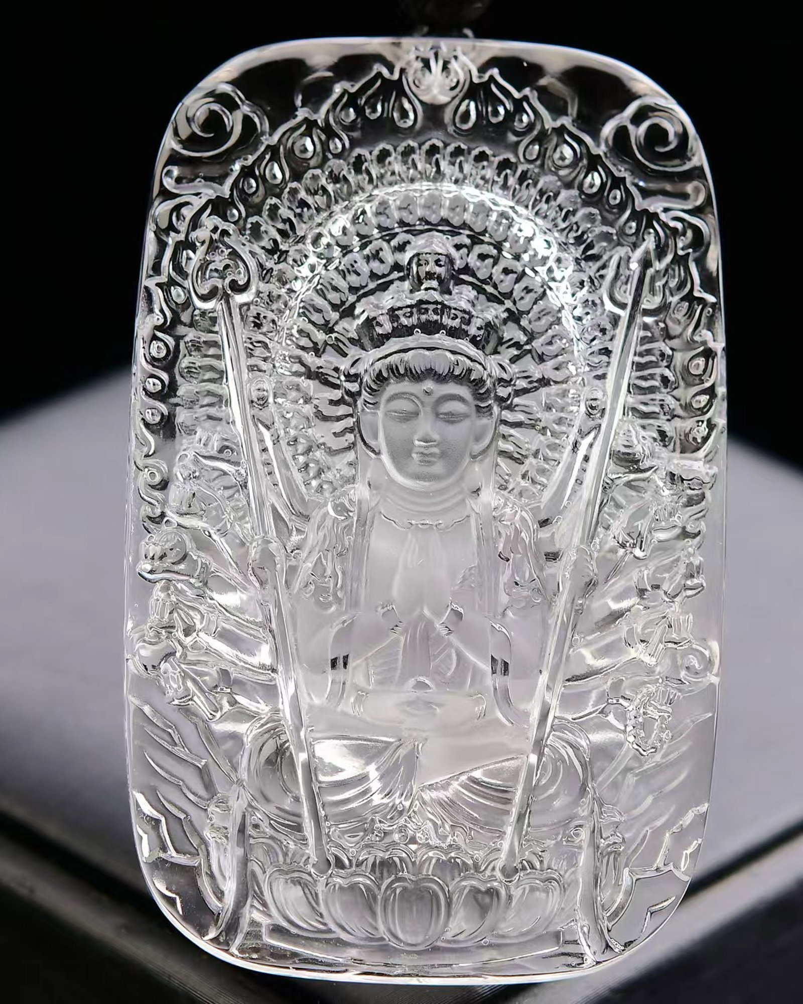 An Exquisite Crystal Statue of Thousand-hand Guanyin Pattern Pendant: An Exquisite Crystal Statue of Thousand-hand Guanyin Pattern Pendant,Size:72mmx44mmx9mm,Weight:75.4g 寓意事事如意,康乐吉祥,平安&