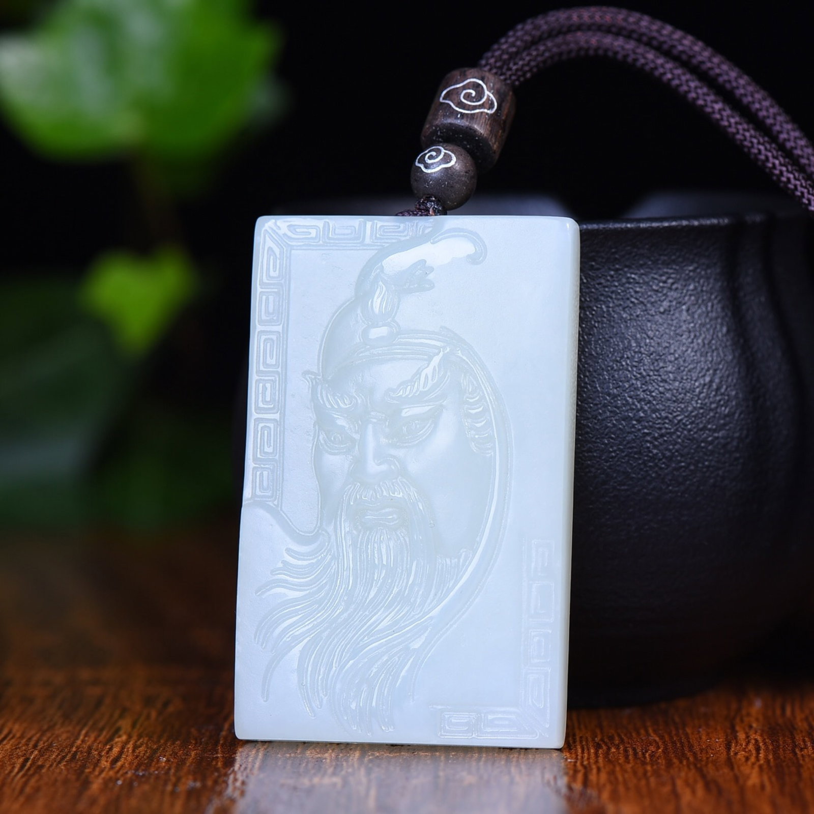 An Exquisite White Jade Guangong Pattern Pendant: An Exquisite White Jade Guangong Pattern Pendant,Size:32mmx51mm (寓意)保佑平安的护法珈蓝,佩戴关公,福