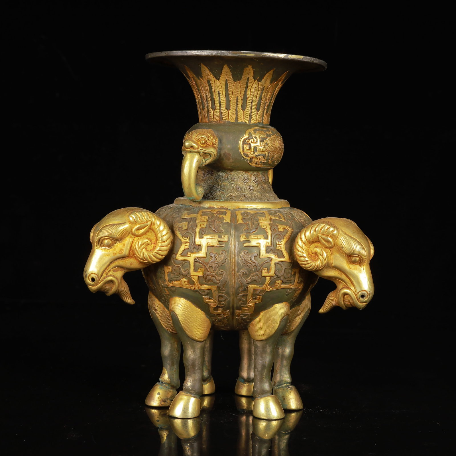 An Exquisite Gilt Silver Beast-Ears Sheep Cup: An Exquisite Gilt Silver Beast-Ears Sheep Cup,Tang Dynasty,China,Zhenguan Four-Character Mark,Size:6.3inx7.5in,Weight:600g 银鎏金兽耳羊杯,中国