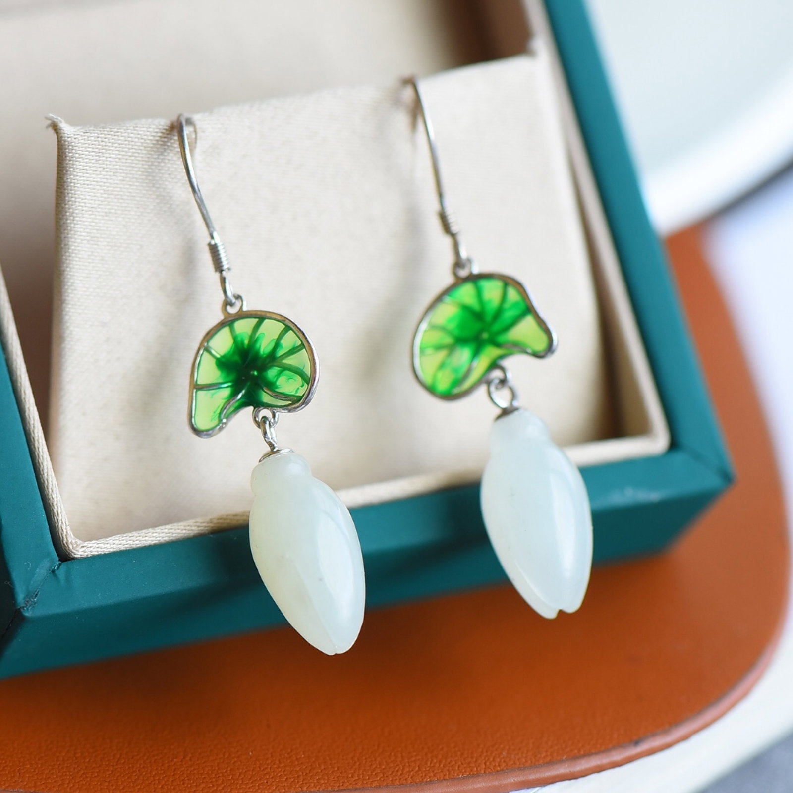 A Pair of Exquisite Sterling Silver Inlaid White Jade Earrings: A Pair of Exquisite Sterling Silver Inlaid White Jade Earrings,Size:9mmx15mm 一对纯银镶白玉耳环