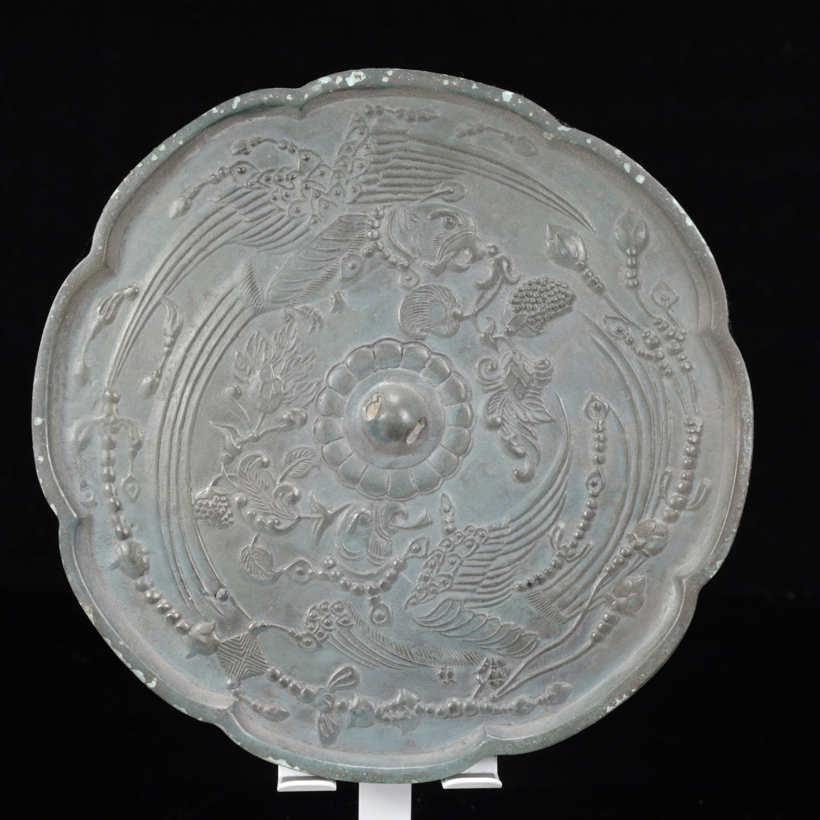 An Archaic Bronze Flower and Phoenix Pattern Round Mirror (1 of 10)