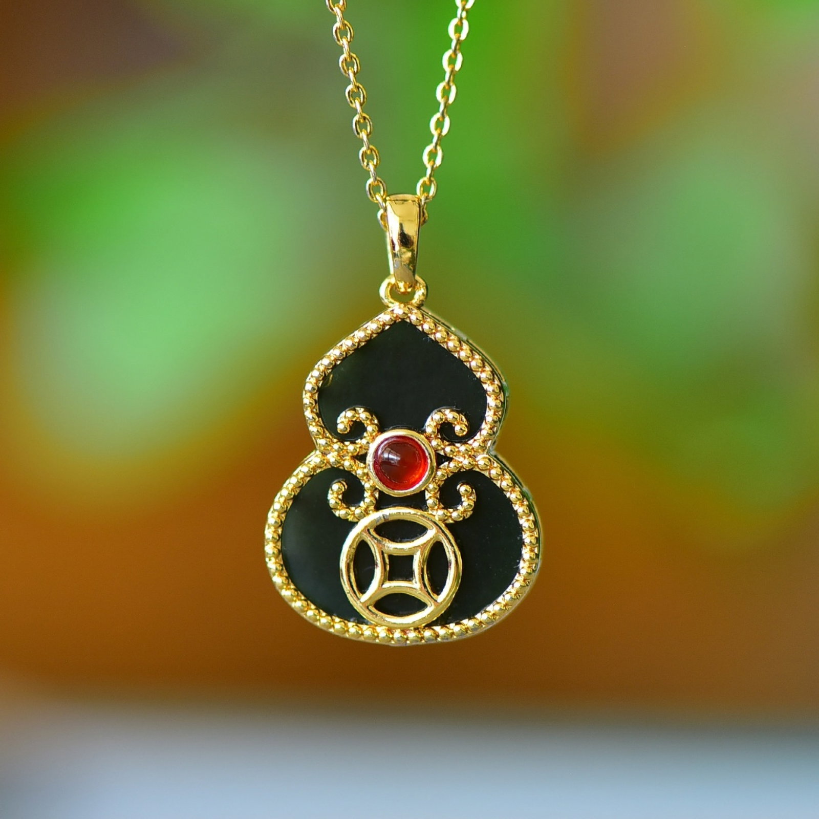 An Exquisite Bronze-Gold Plated Inlaid Green Jade Gourd Necklace: An Exquisite Bronze-Gold Plated Inlaid Green Jade Gourd Necklace,Size:16mmx21mm 铜镀金镶青玉葫芦项链