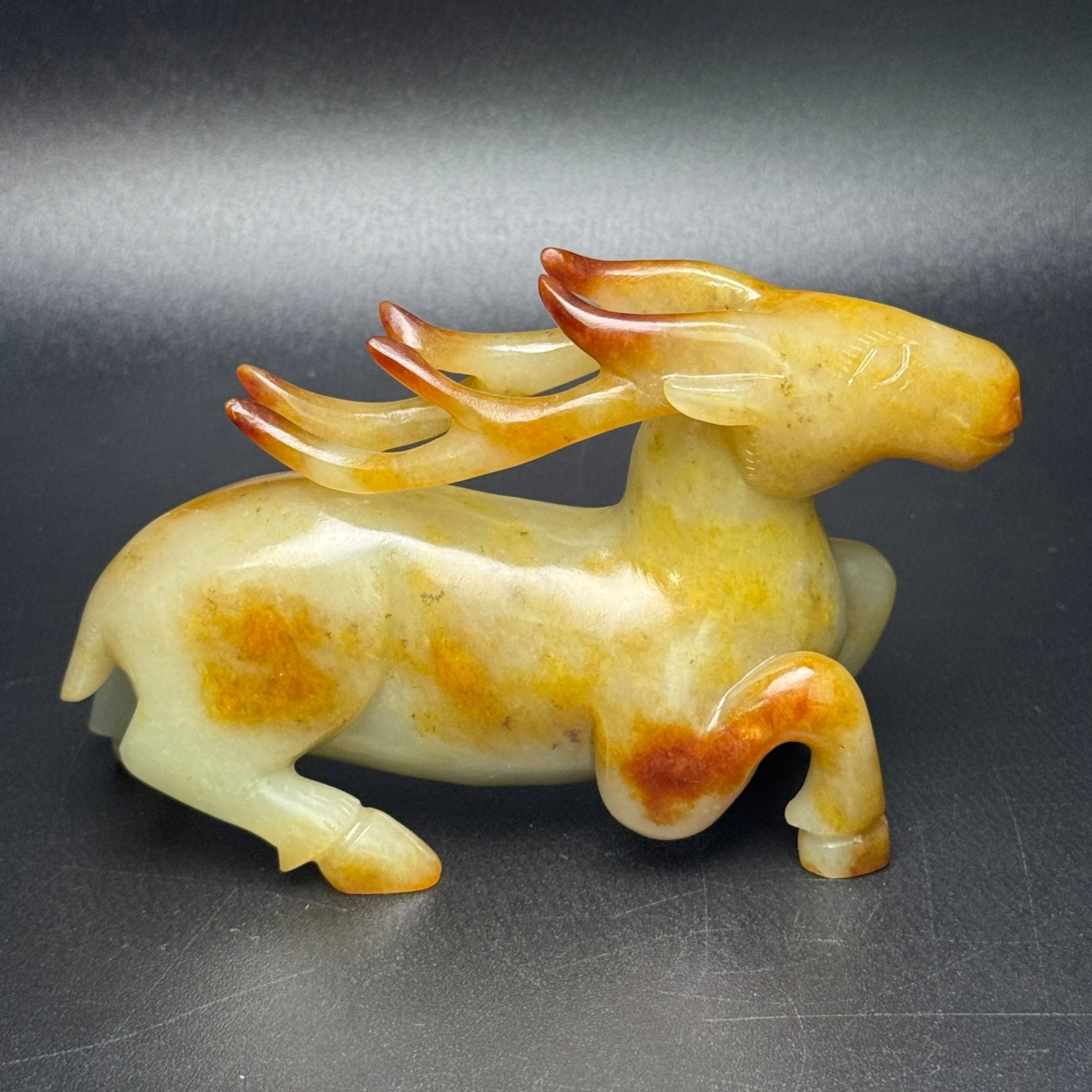 An Exquisite White Jade Deer Ornament: An Exquisite White Jade Deer Ornament,Qing Dynasty,China,Size:68mmx100mmx36mm,Weight:258g 白玉鹿摆件,中国清代