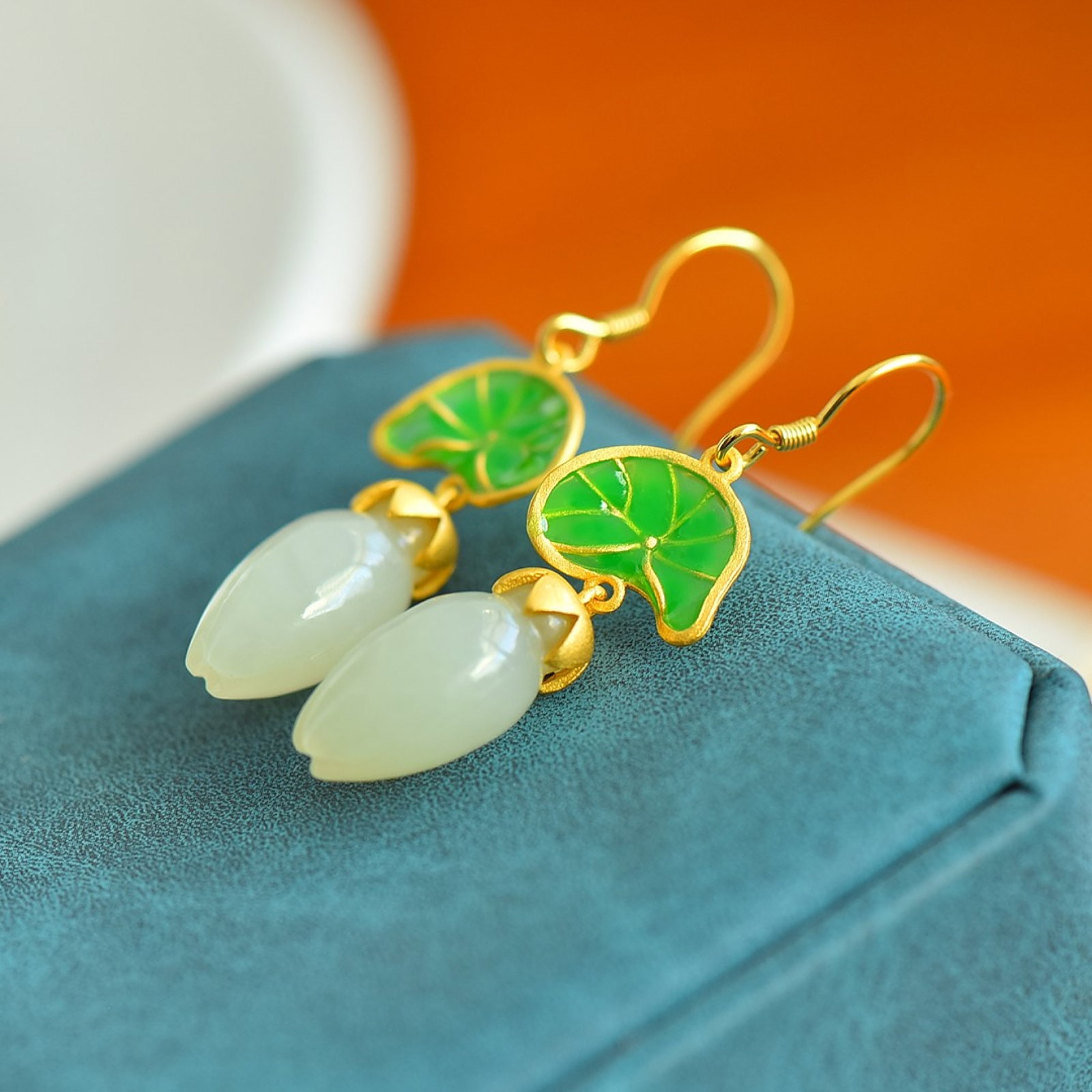 A Pair of Exquisite Sterling Silver-Gold Plated Inlaid White Jade Earrings: A Pair of Exquisite Sterling Silver-Gold Plated Inlaid White Jade Earrings,Size:9mmx17mm 一对纯银镀金镶白玉耳环