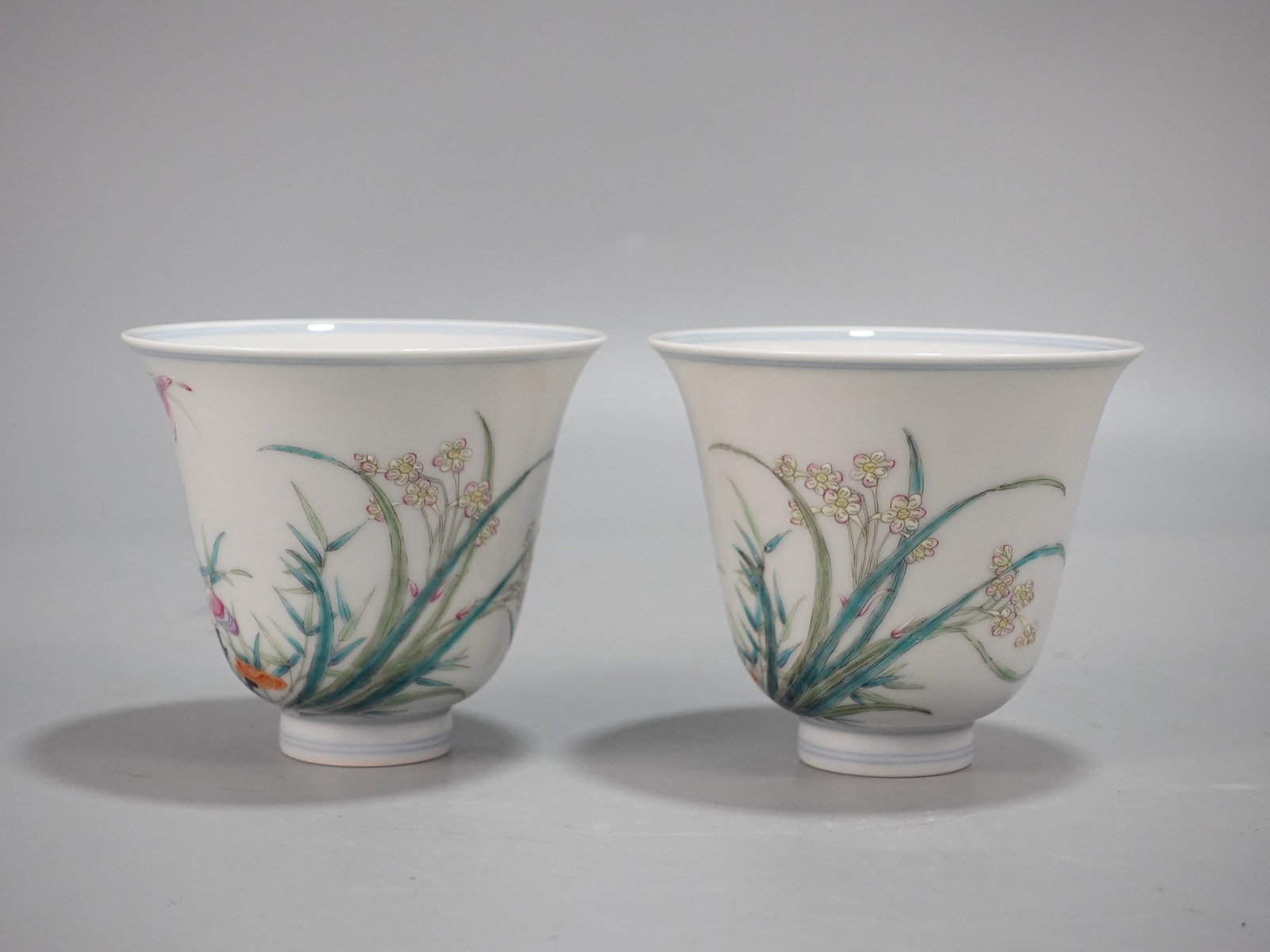 A Pair of Exquisite Famille-Rose Flower and Butterfly Pattern Cups: A Pair of Exquisite Famille-Rose Flower and Butterfly Pattern Cups,Qing Dynasty,China,Yongzheng Four-character Mark,Size:3.1inx3.6in 一对粉彩花卉蝴蝶