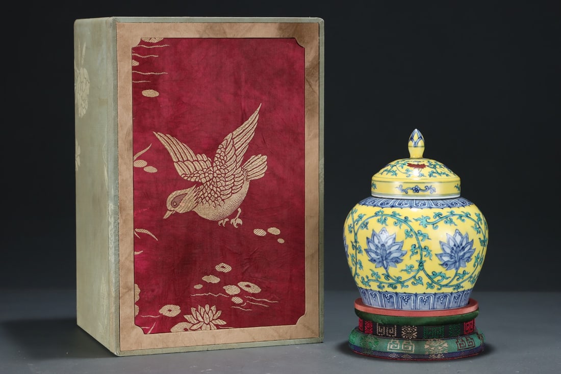 An Exquisite Yellow Ground Blue and White Lotus Pattern Jar with Cover: An Exquisite Yellow Ground Blue and White Lotus Pattern Jar with Cover,Ming Dynasty,China,Chenghua Six-character Mark,Size:7.5inx6.2in 黄地青花缠枝莲纹&