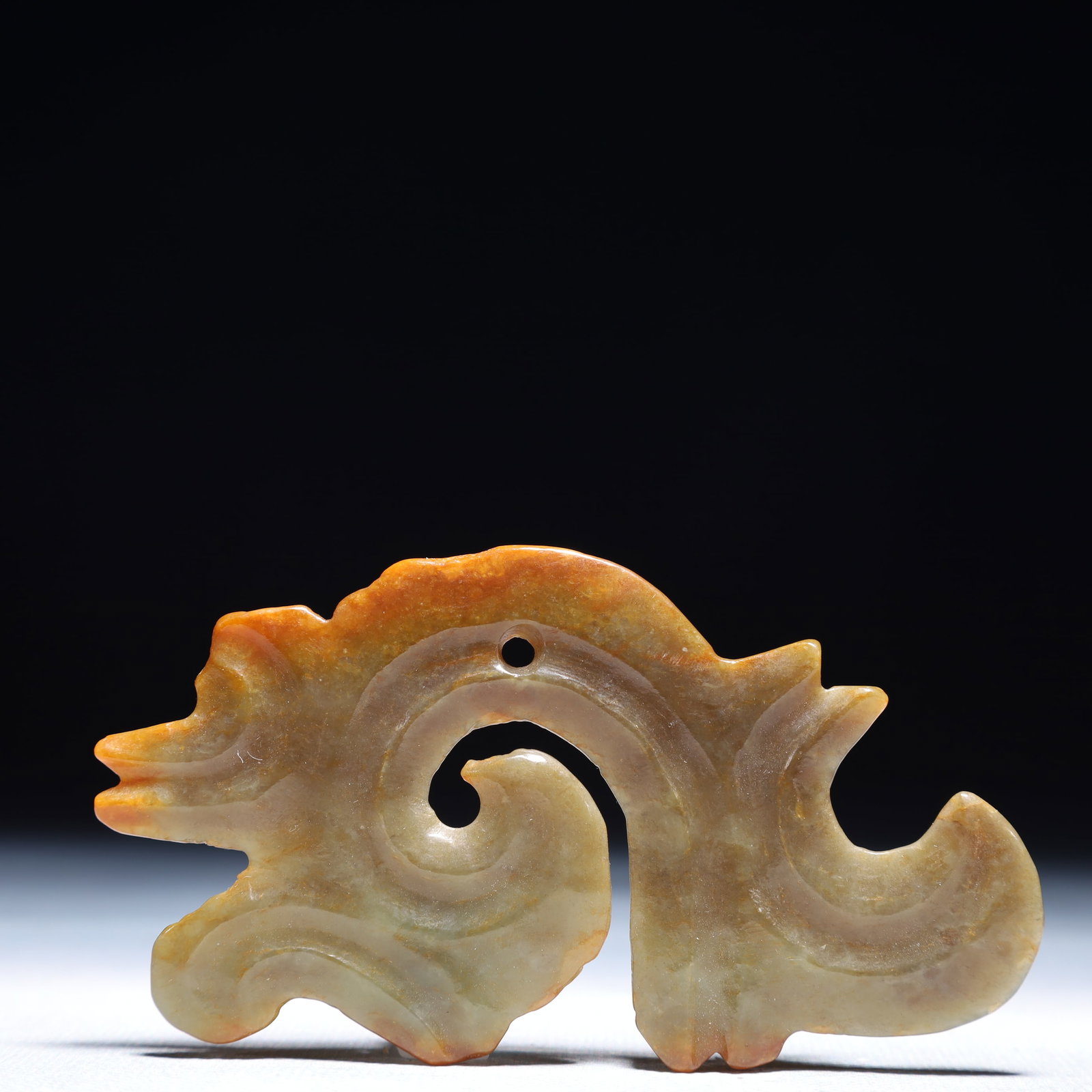 An Archaic Hongshan Culture Yellow Jade Auspicious Cloud Pattern Pendant: An Archaic Hongshan Culture Yellow Jade Auspicious Cloud Pattern Pendant,Ancient Time,China,Size:3.7inx2.2in,Weight:38.6g 红山文化黄玉祥云纹০