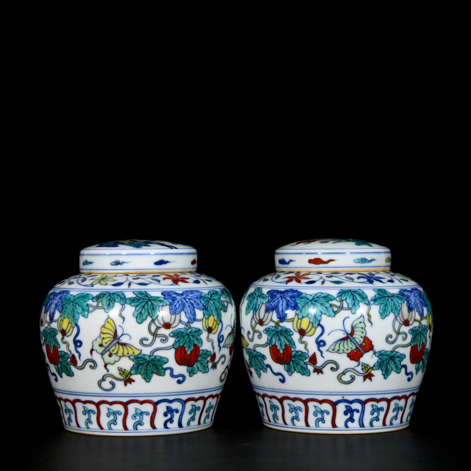 A Pair of Exquisite Doucai Pumpkin and Butterfly Pattern Jars with Cover: A Pair of Exquisite Doucai Pumpkin and Butterfly Pattern Jars with Cover,Ming Dynasty, China,Size:5.1inx5.9in 一对斗彩南瓜蝴蝶纹盖罐,&