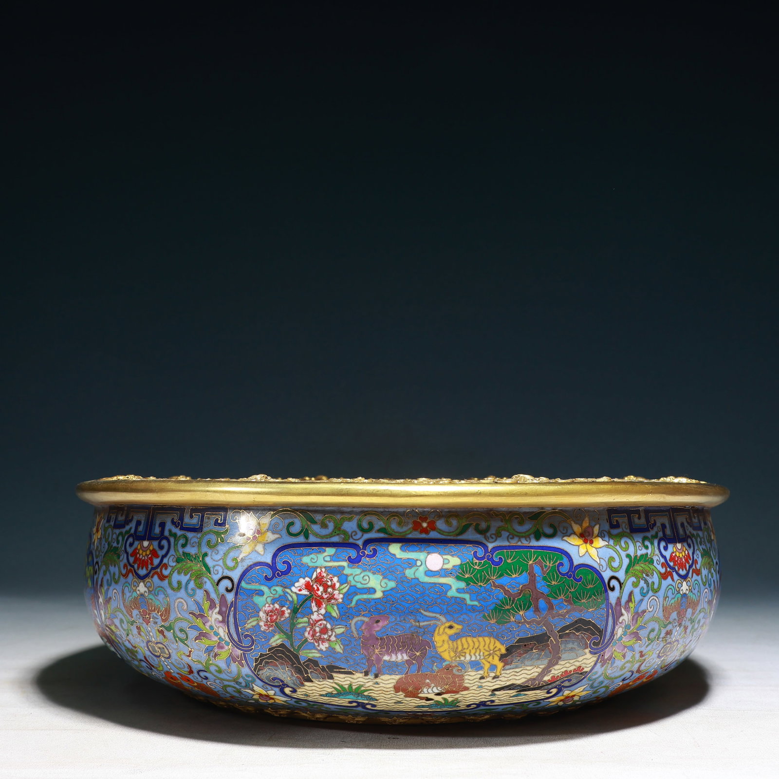 A Rare Cloisonne Lotus and Animal Pattern Basin: A Rare Cloisonne Lotus and Animal Pattern Basin,Qing Dynasty, China,Size:14.6inx4.5in,Weight:11550g 景泰蓝缠枝莲动物纹盆,中国