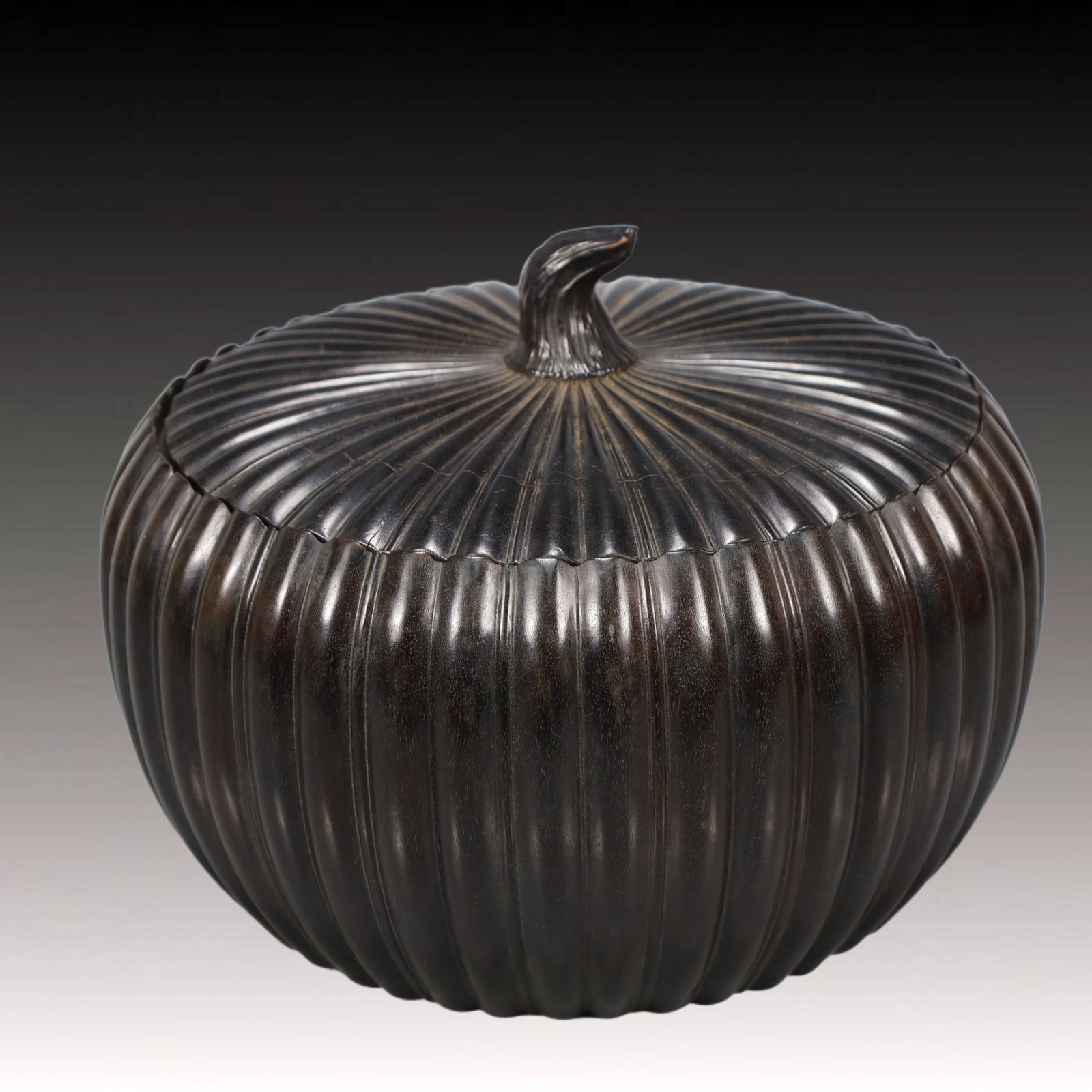 An Exquisite Zitanwood Pumpkin-Shaped Cover Jar: An Exquisite Zitanwood Pumpkin-Shaped Cover Jar,Qing Dynasty, China,Size:5.9inx10in,Weight:3700g 紫檀木南瓜形盖罐,中国清代