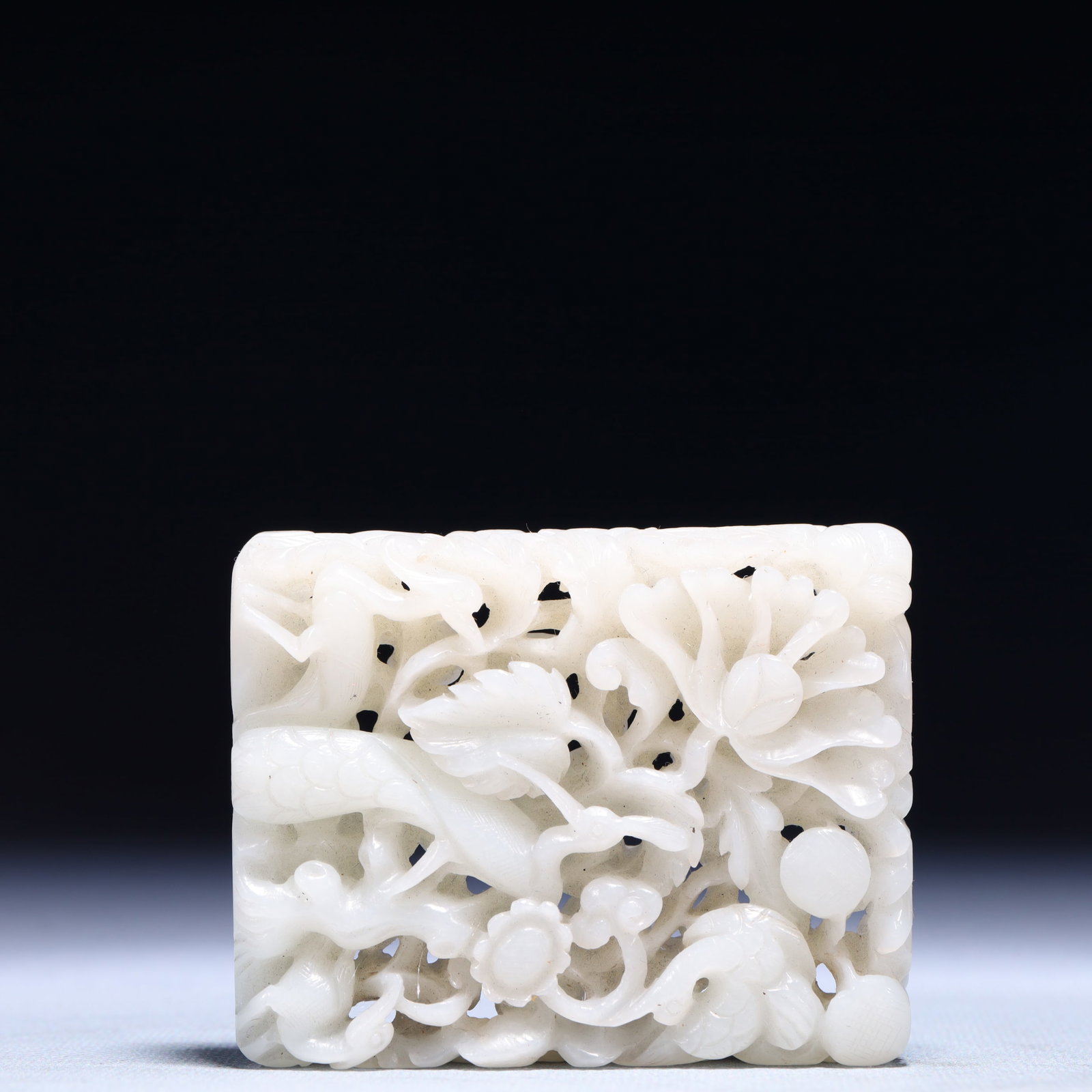 An Exquisite White Jade Flower and Bird Pattern Ornament: An Exquisite White Jade Flower and Bird Pattern Ornament,Qing Dynasty,China,Size:2.6inx0.6inx3.1in,Weight:183.6g 白玉花鸟纹摆件,中国清ߣ