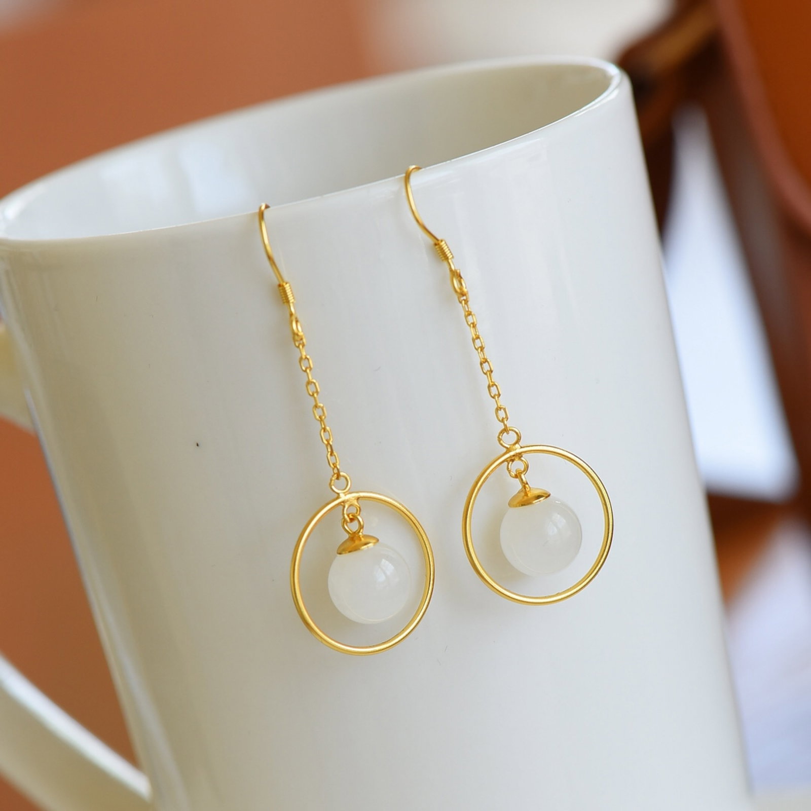 A Pair of Exquisite Sterling Silver-Gold Plated Inlaid White Jade Earrings: A Pair of Exquisite Sterling Silver-Gold Plated Inlaid White Jade Earrings,Size:10mmx10mm 一对纯银镀金镶白玉耳环