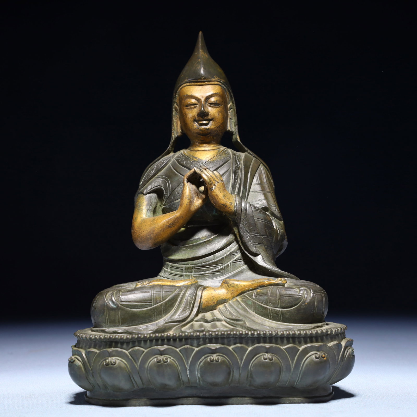A Solemn Gilt Bronze Statue of Tsongkhapa: A Solemn Gilt Bronze Statue of Tsongkhapa,Qing Dynasty,China,Size:5.1inx3.9inx7.9in,Weight:1350g 铜漆金宗喀巴像,中国清代