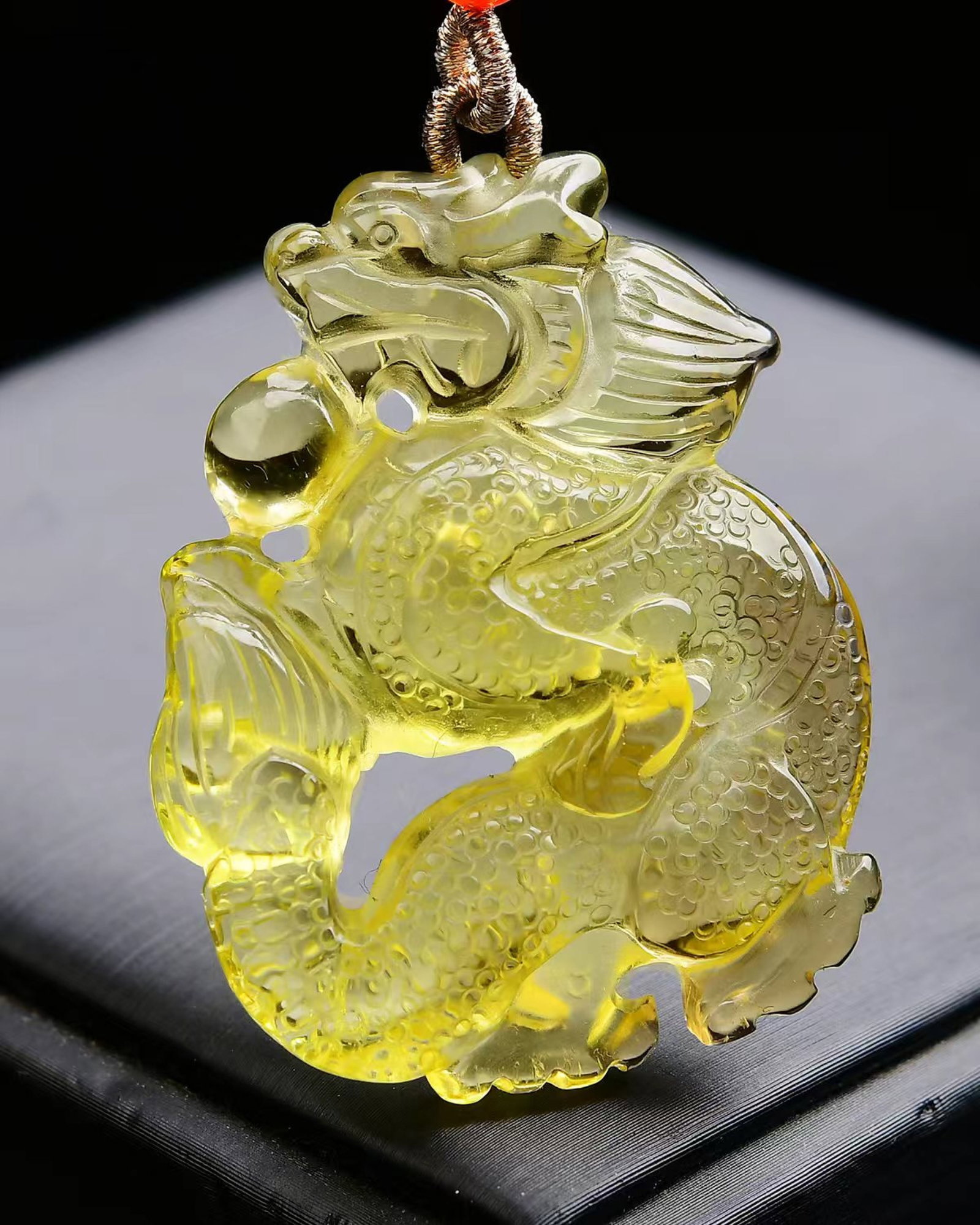 An Exquisite Crystal Dragon Pendant: An Exquisite Crystal Dragon Pendant,Size:48mmx37mmx12mm,Weight:26.7g 寓意生意兴隆,吉祥安康 水晶龙吊坠