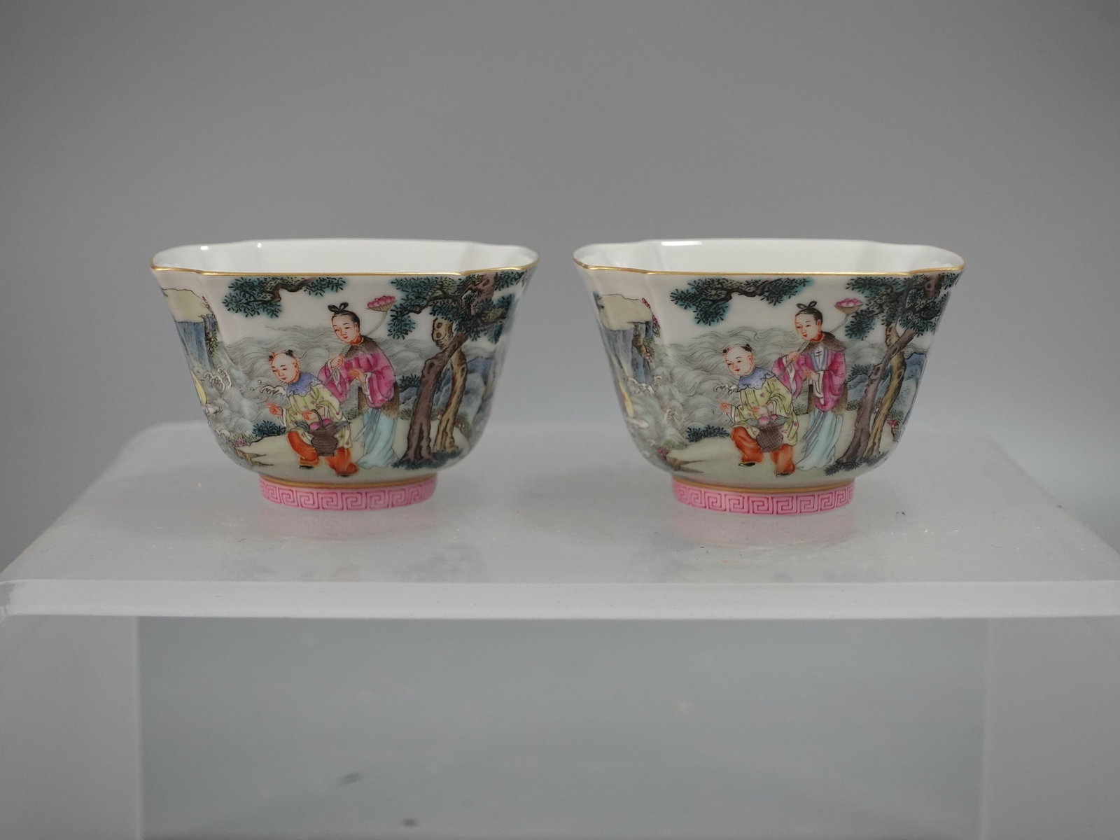 A Pair of Exquisite Famille-Rose Painted Gold Landscape and Figure Pattern Cups: A Pair of Exquisite Famille-Rose Painted Gold Landscape and Figure Pattern Cups,Qing Dynasty,China,Qianlong Six-character Mark,Size:1.8inx2.7in 一对粉彩描金山