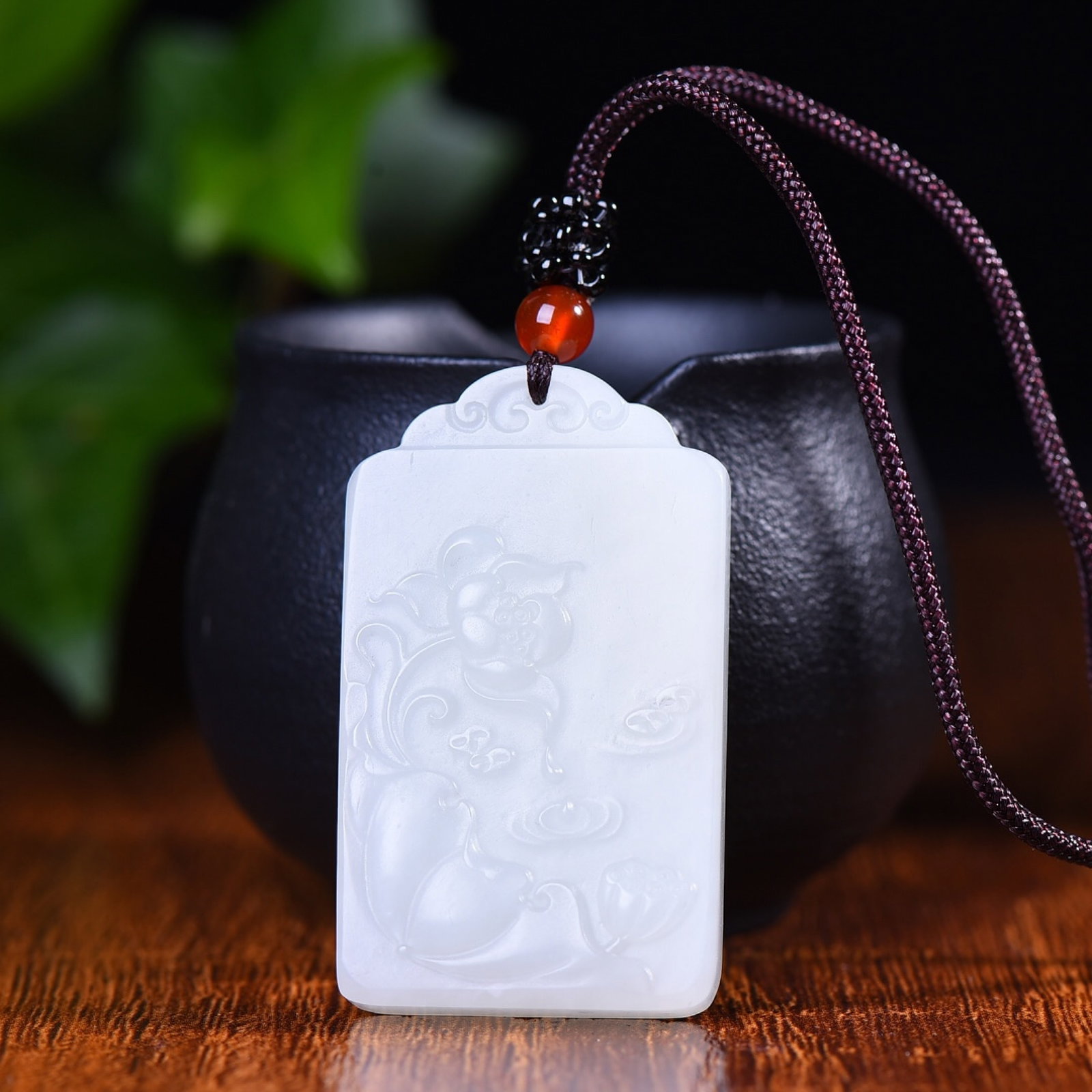 An Exquisite White Jade Lotus Pattern Pendant (1 of 5)