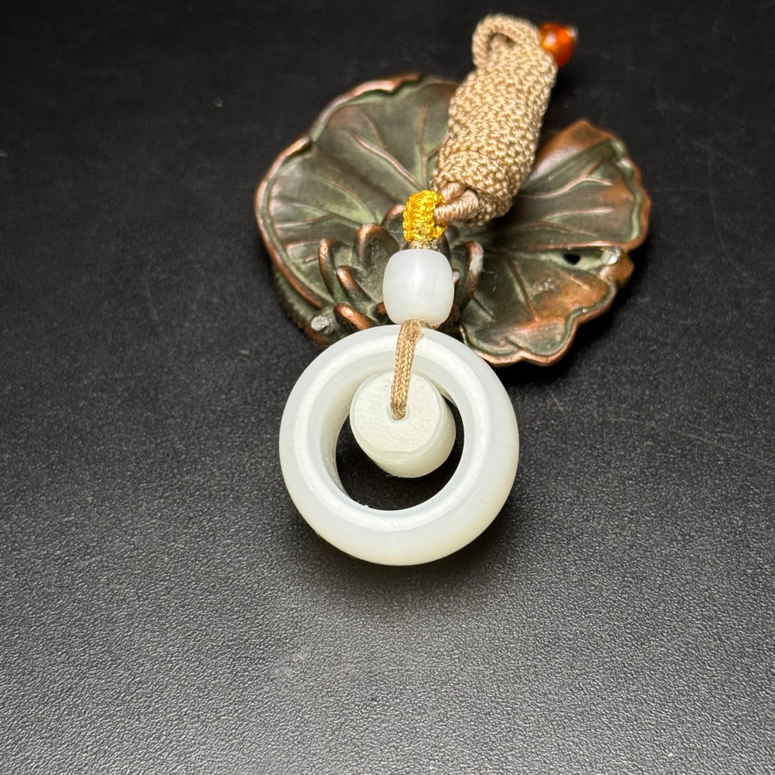 An Exquisite White Jade Pendant: An Exquisite White Jade Pendant,Qing Dynasty,China,Size:26mmx12mm,Weight:17g 白玉挂件,中国清代