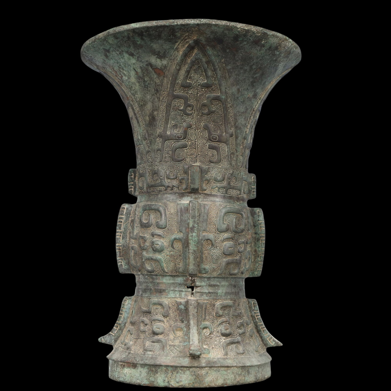 A Rare Bronze Beast-Face Pattern Vase: A Rare Bronze Beast-Face Pattern Vase,Ancient Time, China,Size:8.3inx11.8in ;Weight:3950g 青铜兽面纹瓶，中国远古时期