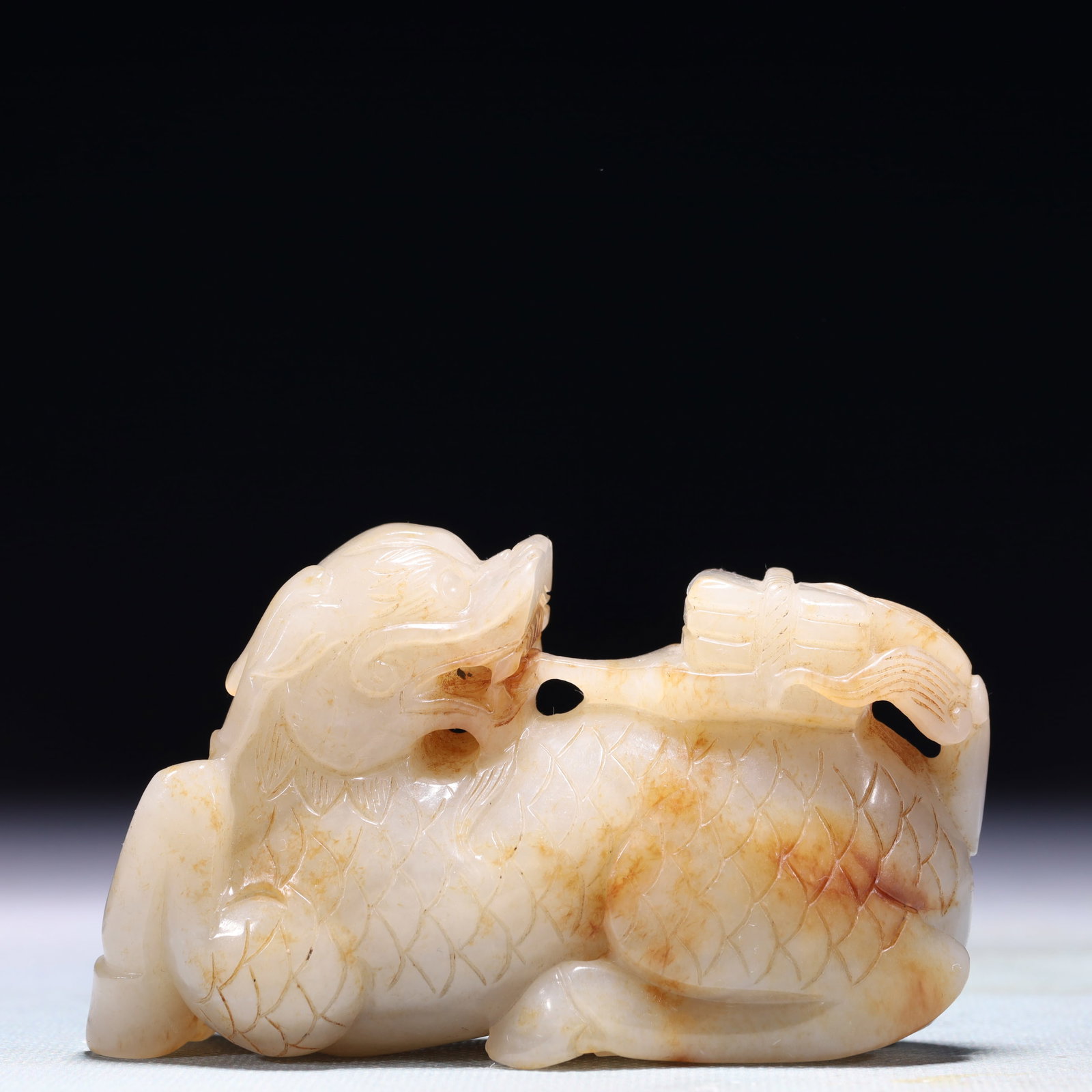 An Exquisite White Jade Kylin Ornament: An Exquisite White Jade Kylin Ornament,Qing Dynasty,China,Size:3.9inx1.4inx2.4in,Weight:350g 白玉麒麟摆件,中国清代