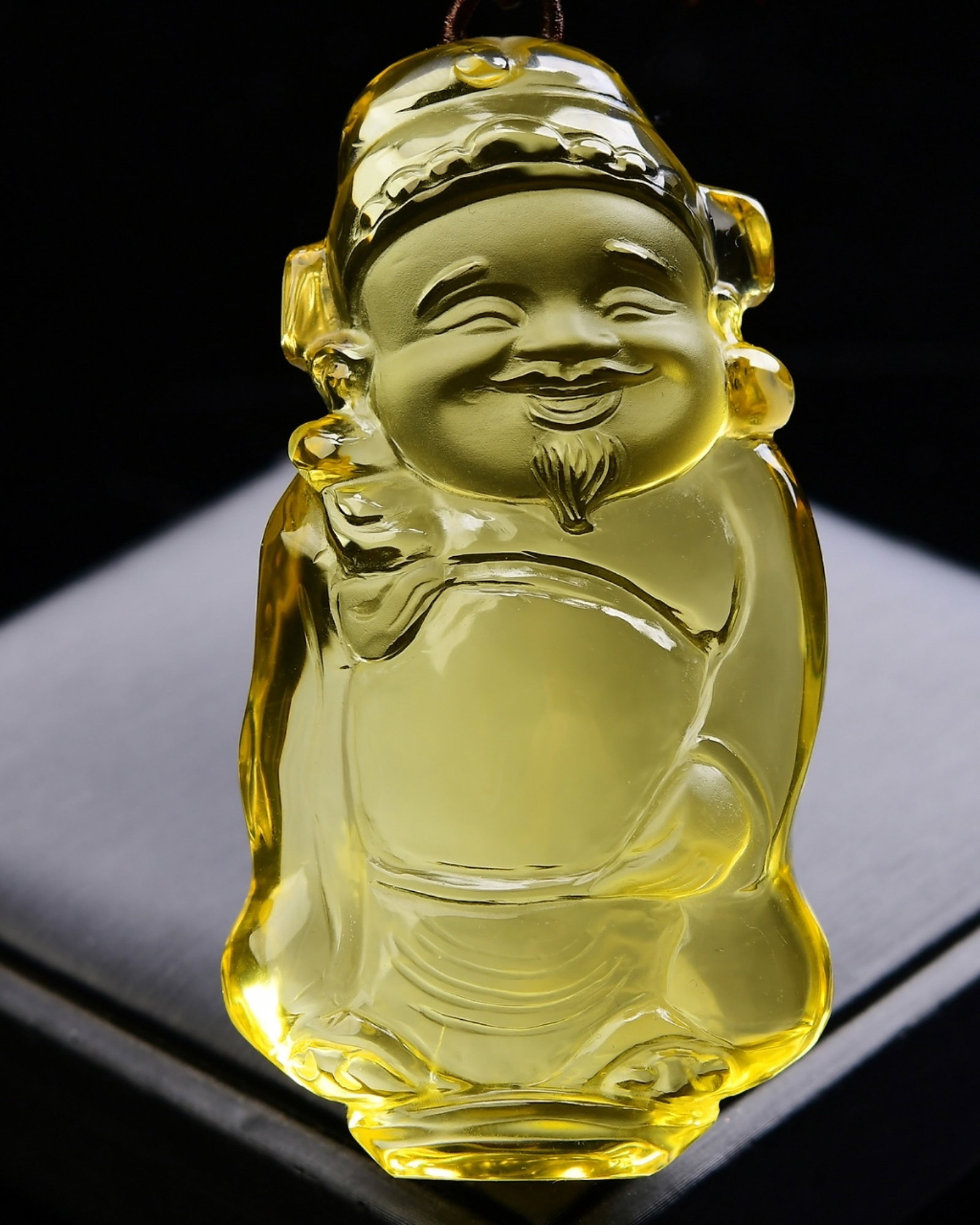 An Exquisite Crystal Statue of Mammon Pendant: An Exquisite Crystal Statue of Mammon Pendant,Size:84mmx42mmx22mm,Weight:139.9g 水晶财神像吊坠
