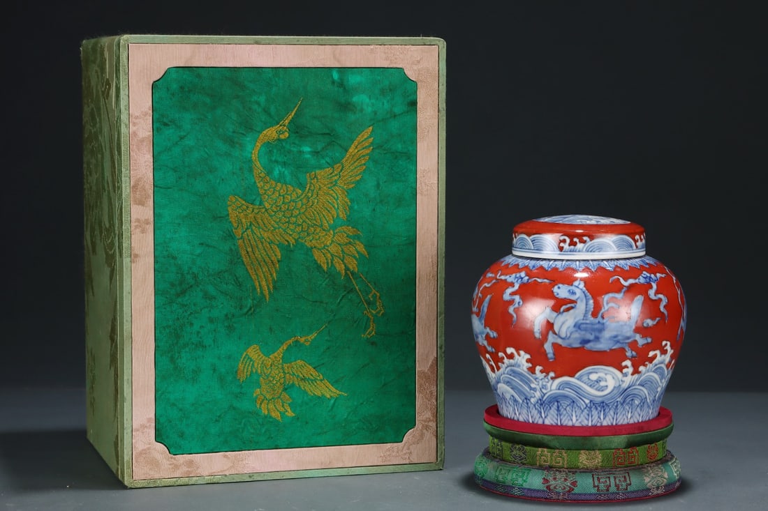 An Exquisite Red Ground Blue and White Seawater Horse Pattern Jar with Cover: An Exquisite Red Ground Blue and White Seawater Horse Pattern Jar with Cover,Ming Dynasty,China,Chenghua Six-character Mark,Size:5.5inx5.9in 红地青花海水马