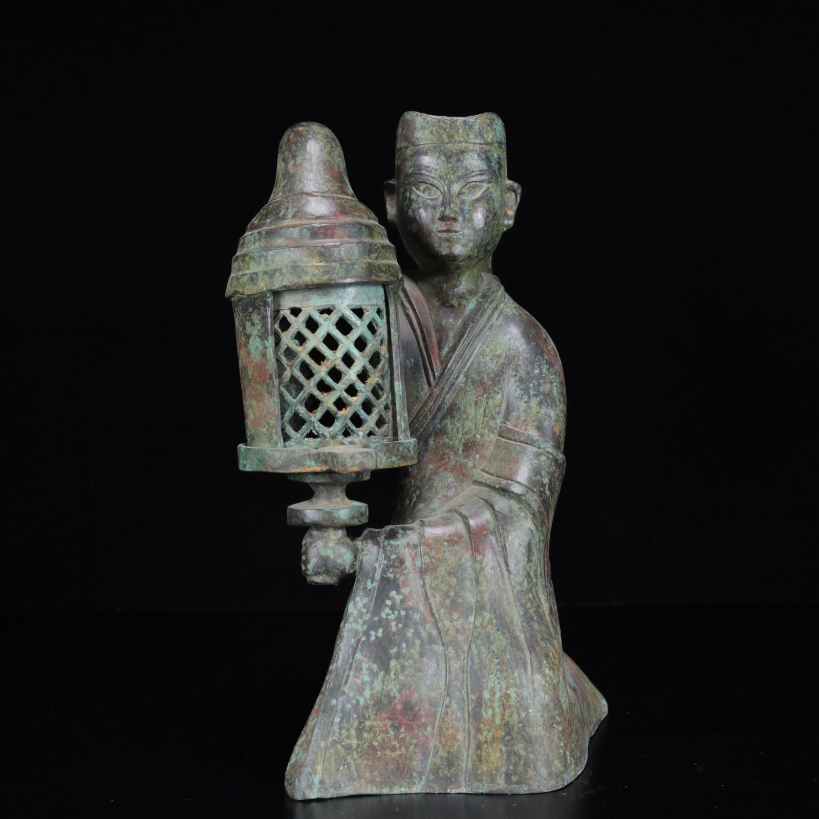 An Archaic Bronze Figure Palace Lantern,with Inscription: An Archaic Bronze Figure Palace Lantern,with Inscription,the Warring States Period in China,Size:6.3inx4.7inx10.6in,Weight:2100g 青铜人物宫灯,带铭ਧ