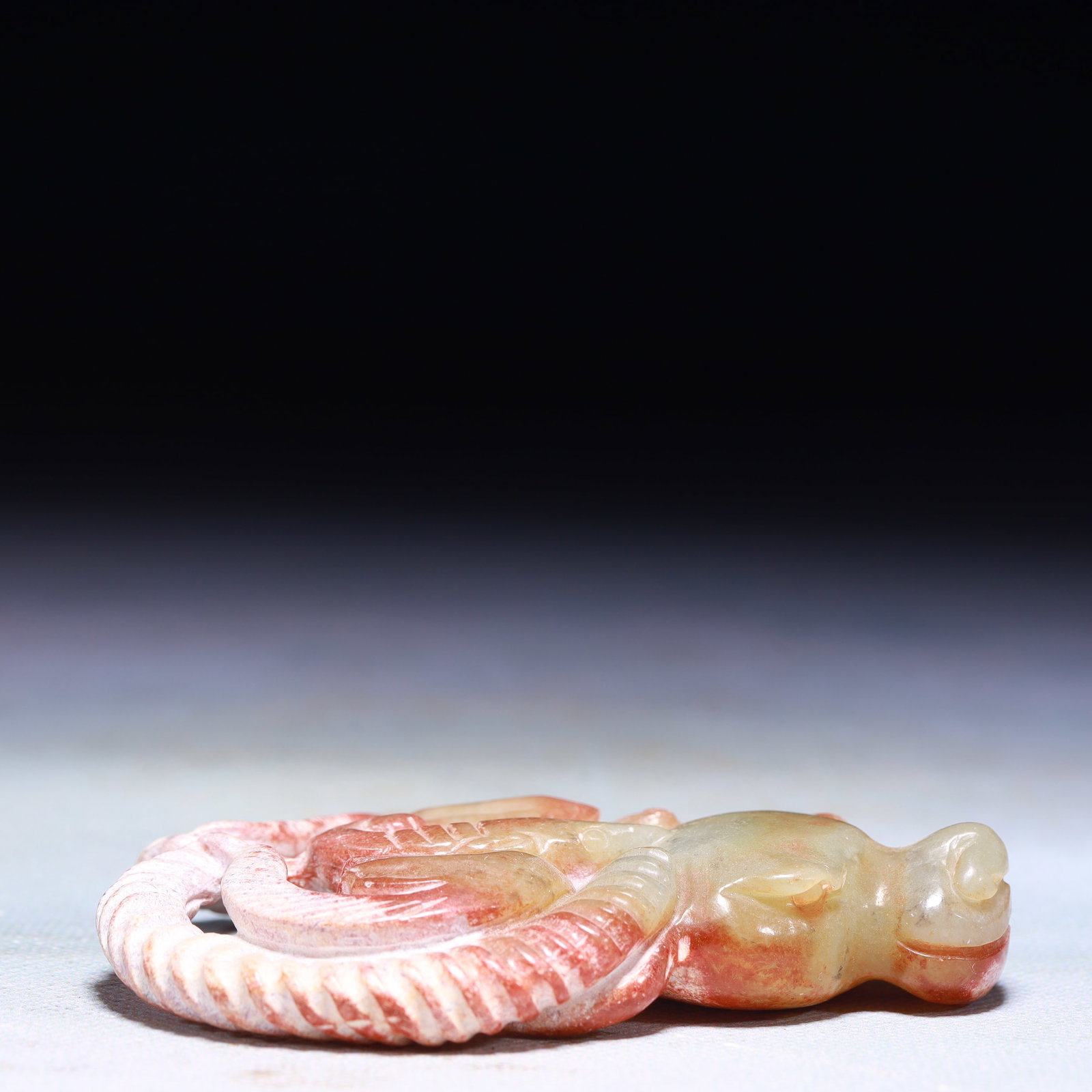 An Exquisite Archaic Jade Sheep Ornament: An Exquisite Archaic Jade Sheep Ornament,Ancient Time,China,Size:6.3inx0.8inx1.2in,Weight:137g 高古玉羊摆件中国远古时期