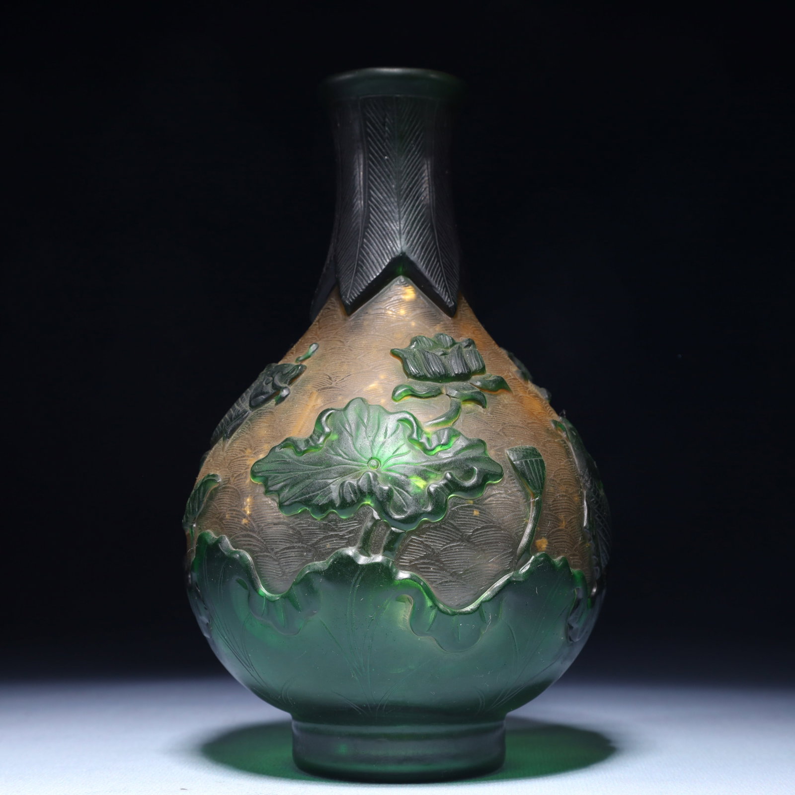 An Exquisite Glass Lotus Fish Pattern Vase: An Exquisite Glass Lotus Fish Pattern Vase,Qing Dynasty,China,Qianlong Four-character Mark,Size:4.3inx7.1in,Weight:400g 琉璃莲花鱼纹瓶,中国清