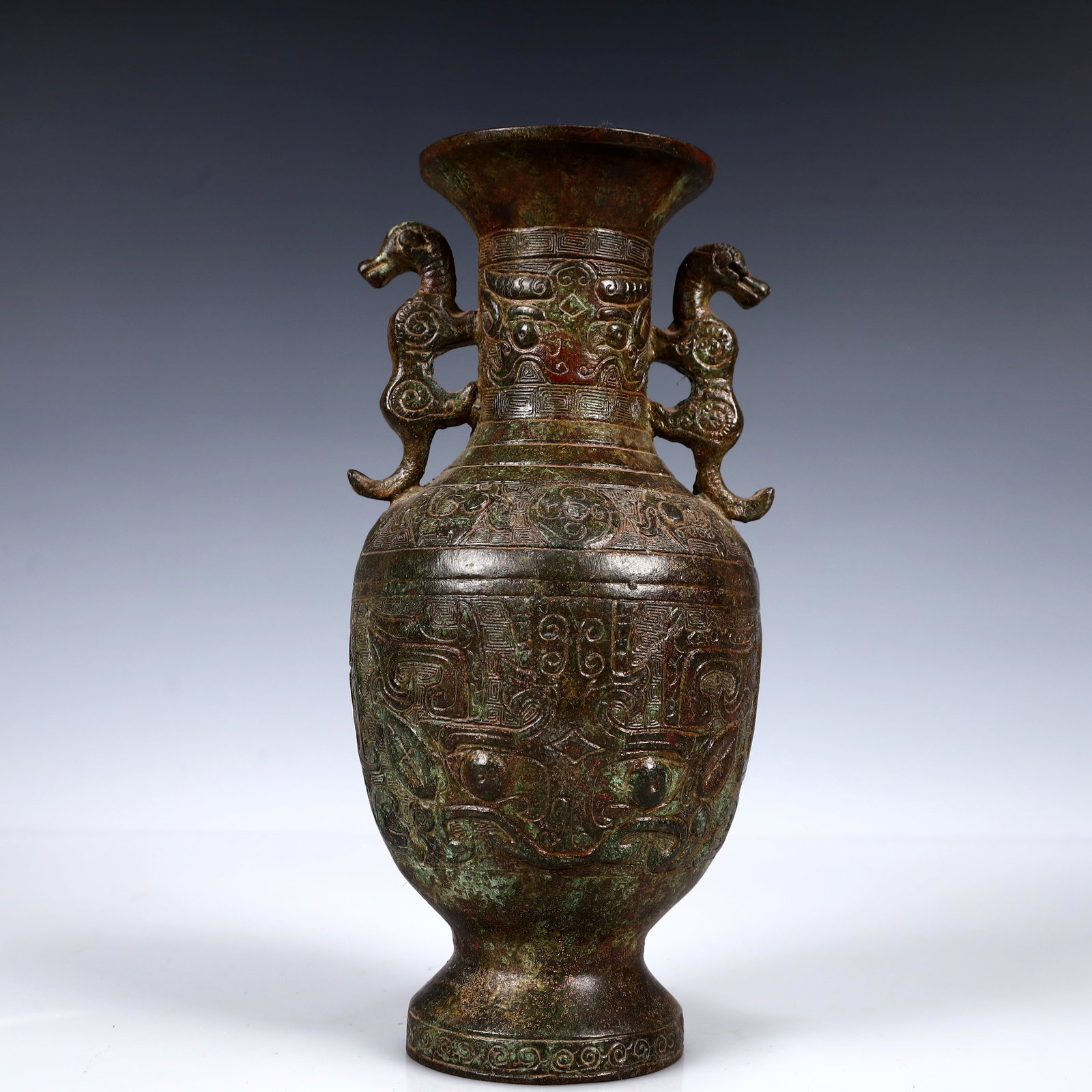 A Rare Bronze Beast-Face Pattern Double-Ears Vase: A Rare Bronze Beast-Face Pattern Double-Ears Vase,W.Zhou,China,Size:4.3inx4.3inx9.4in,Weight:1050g 青铜兽面纹双耳瓶,中国西周