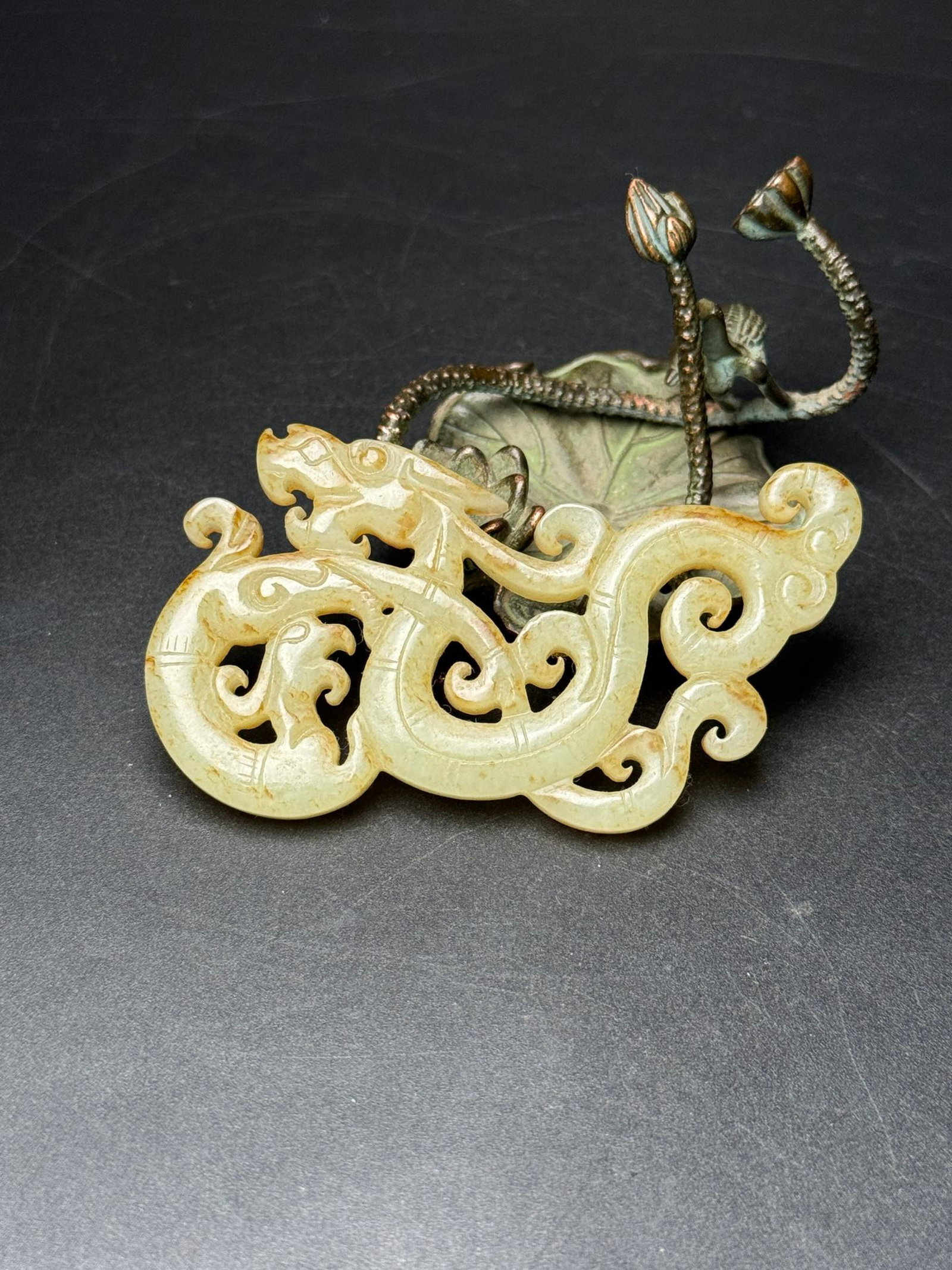 An Exquisite White Jade Dragon and Phoenix Pattern Pendant: An Exquisite White Jade Dragon and Phoenix Pattern Pendant,Qing Dynasty,China,Size:77mmx43mmx6mm,Weight:32g 白玉龙凤纹挂件,中国清代