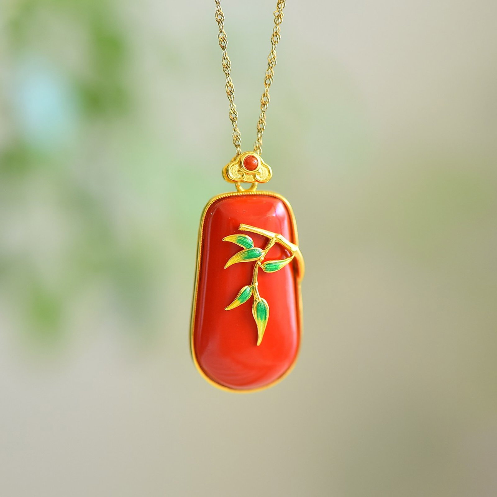 An Exquisite Sterling Silver-Gold Plated Inlaid Cinnabar Necklace: An Exquisite Sterling Silver-Gold Plated Inlaid Cinnabar Necklace,Size:16mmx30mm 纯银镀金镶朱砂项链