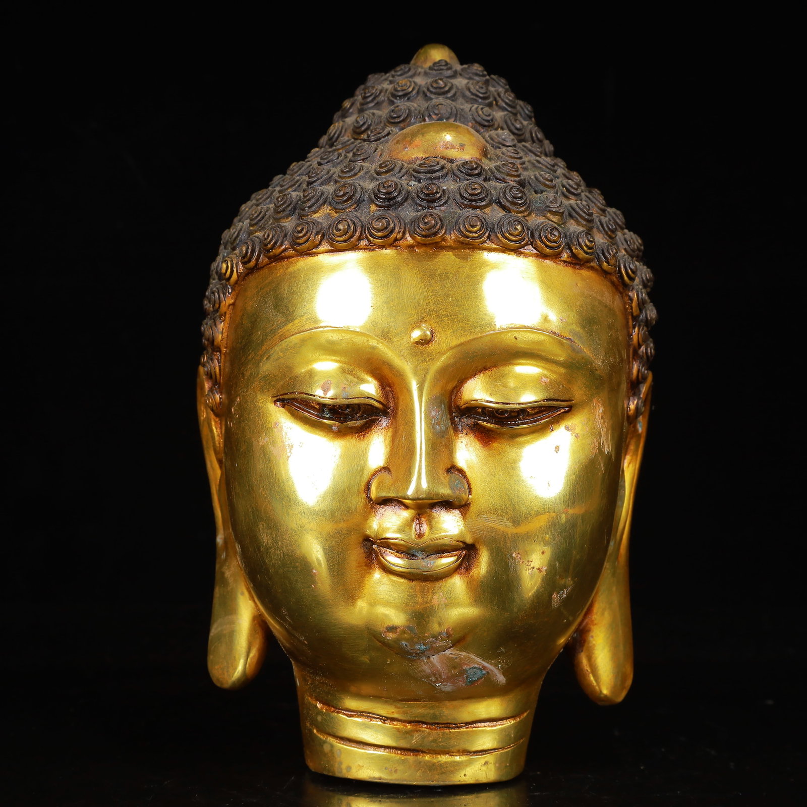 An Exquisite Gilt Bronze Statue of Sakyamuni Head: An Exquisite Gilt Bronze Statue of Sakyamuni Head,Qing Dynasty,China,Size:5.5inx8.7in,Weight:2650g 铜鎏金释迦摩尼头像,中国清