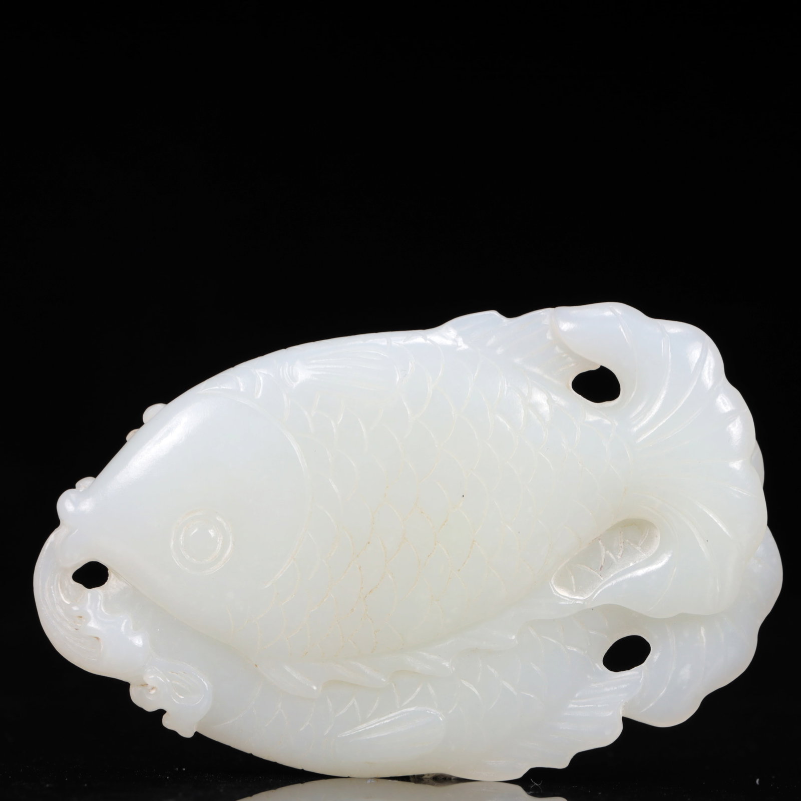 An Exquisite White Jade Fish Pendant: An Exquisite White Jade Fish Pendant,Qing Dynasty, China,Size:3.5inx0.3inx2in,Weight:88g 白玉鱼挂件,中国清代