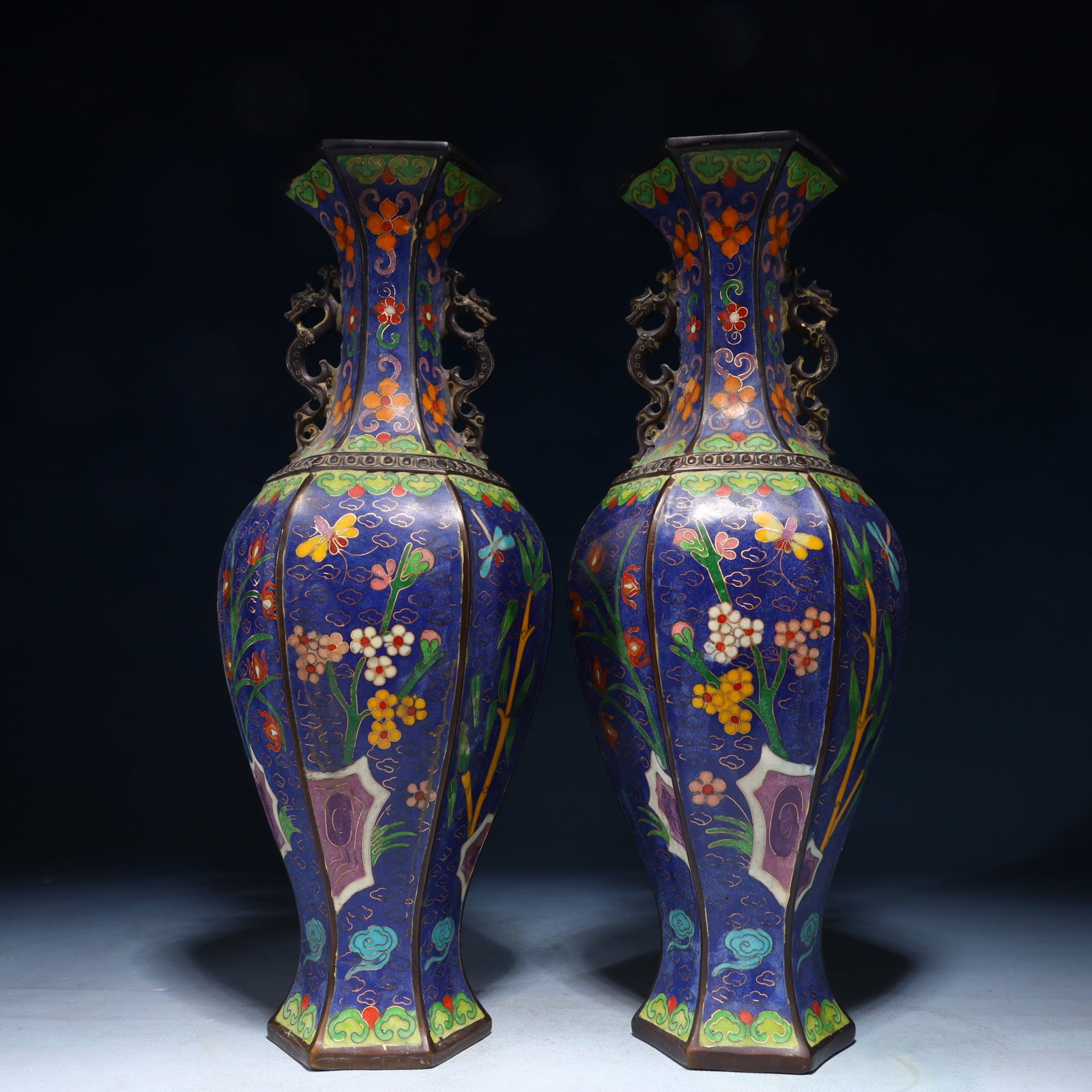 A Pair of Exquisite Cloisonne Flower Pattern Double-Ears Vases: A Pair of Exquisite Cloisonne Flower Pattern Double-Ears Vases,Qing Dynasty,China,Qianlong Four-character Mark,Size:5.9inx5.1inx14.6in,Weight:5300g 一对景泰蓝花