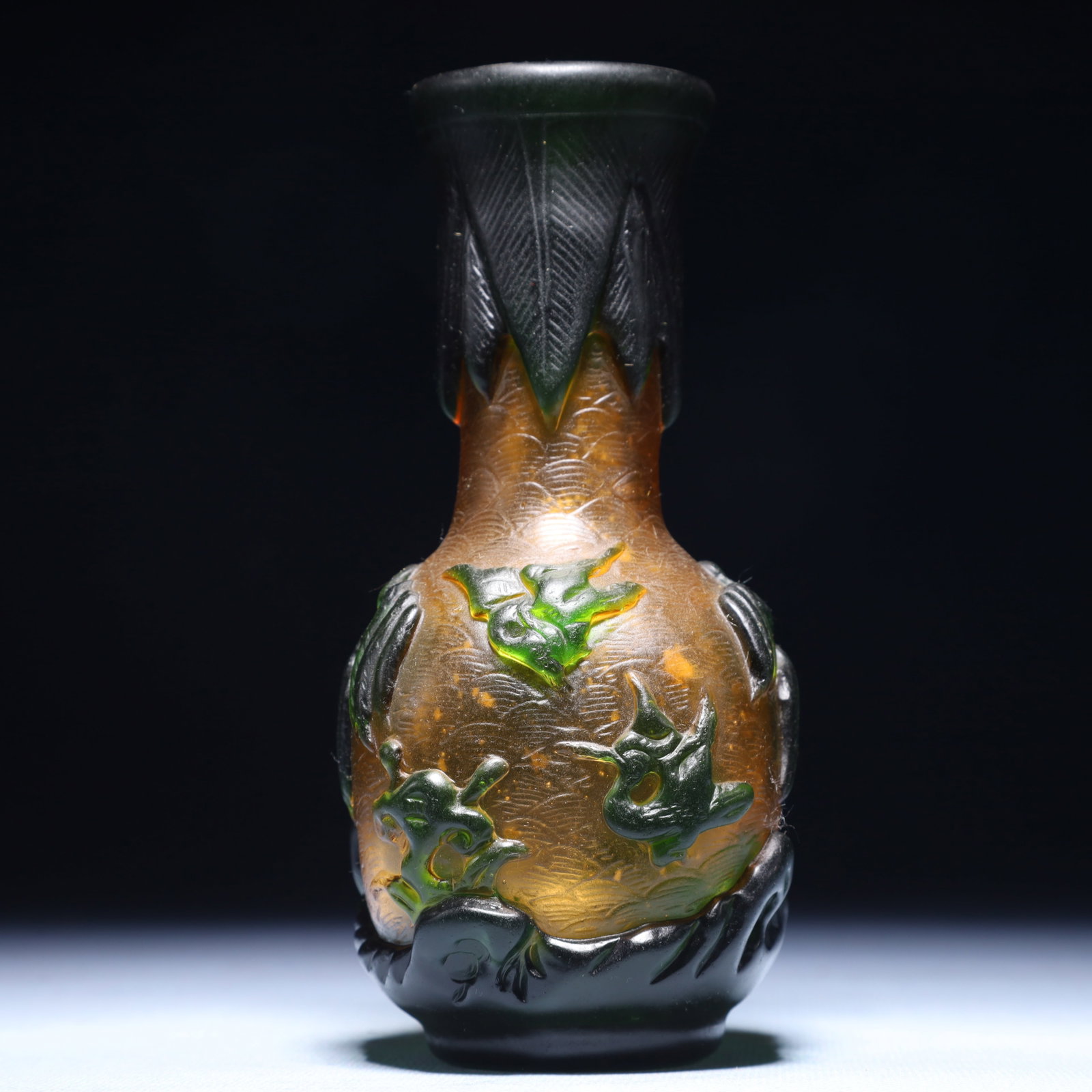 An Exquisite Glass Flower and Bird Pattern Vase: An Exquisite Glass Flower and Bird Pattern Vase,Qing Dynasty,China,Qianlong Four-character Mark,Size:2.4inx5.9in,Weight:350g 琉璃花鸟纹瓶,中国清&#