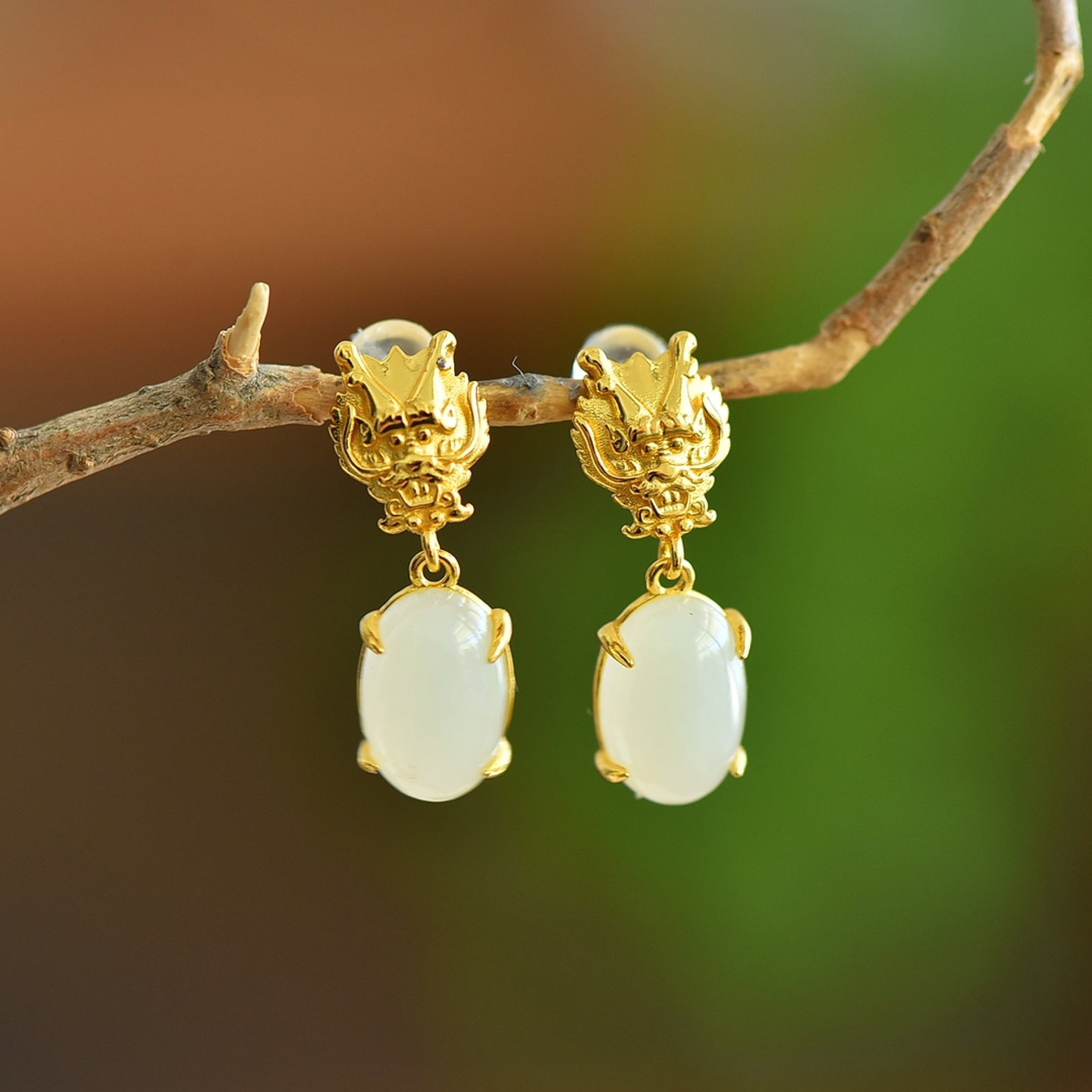 A Pair of Exquisite Sterling Silver-Gold Plated Inlaid White Jade Earrings: A Pair of Exquisite Sterling Silver-Gold Plated Inlaid White Jade Earrings 一对纯银镀金镶白玉耳环