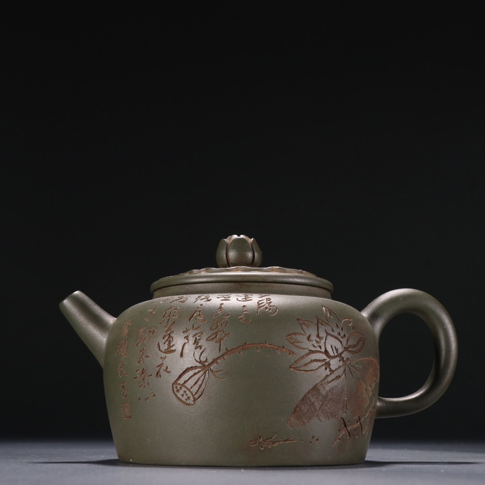 A Rare Purple Sands Lotus Pattern Teapot,with poem: A Rare Purple Sands Lotus Pattern Teapot,with poem,Qing Dynasty,China,Zhu Kaichang Mark,Size:3.1inx5.9in 紫砂莲花纹茶壶,带诗文,中Þ