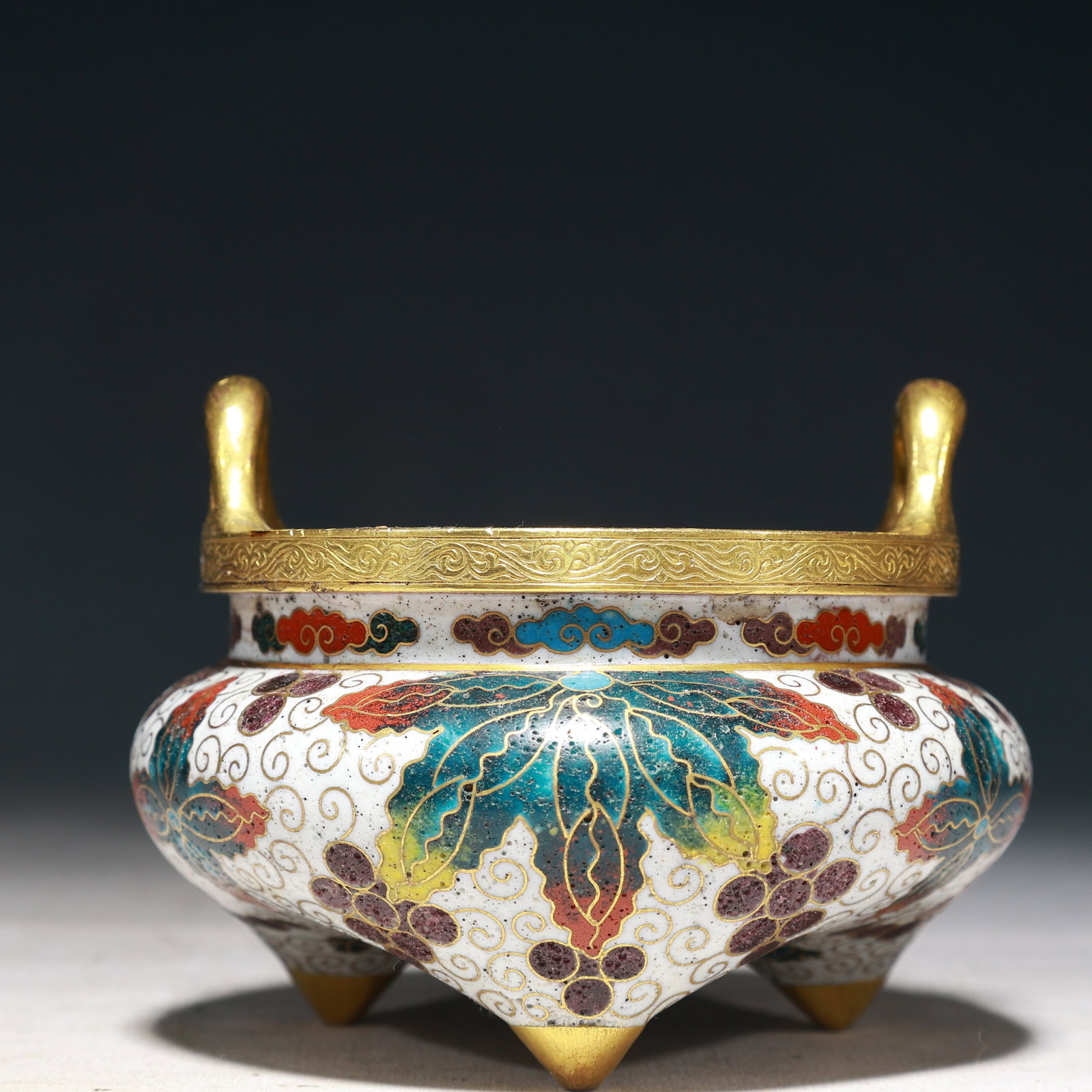 An Exquisite Cloisonne Flower Pattern Double-Ears and Tripod Censer: An Exquisite Cloisonne Flower Pattern Double-Ears and Tripod Censer,Qing Dynasty, China,Size:4.7inx3.5in,Weight:600g 景泰蓝花卉纹双耳三足