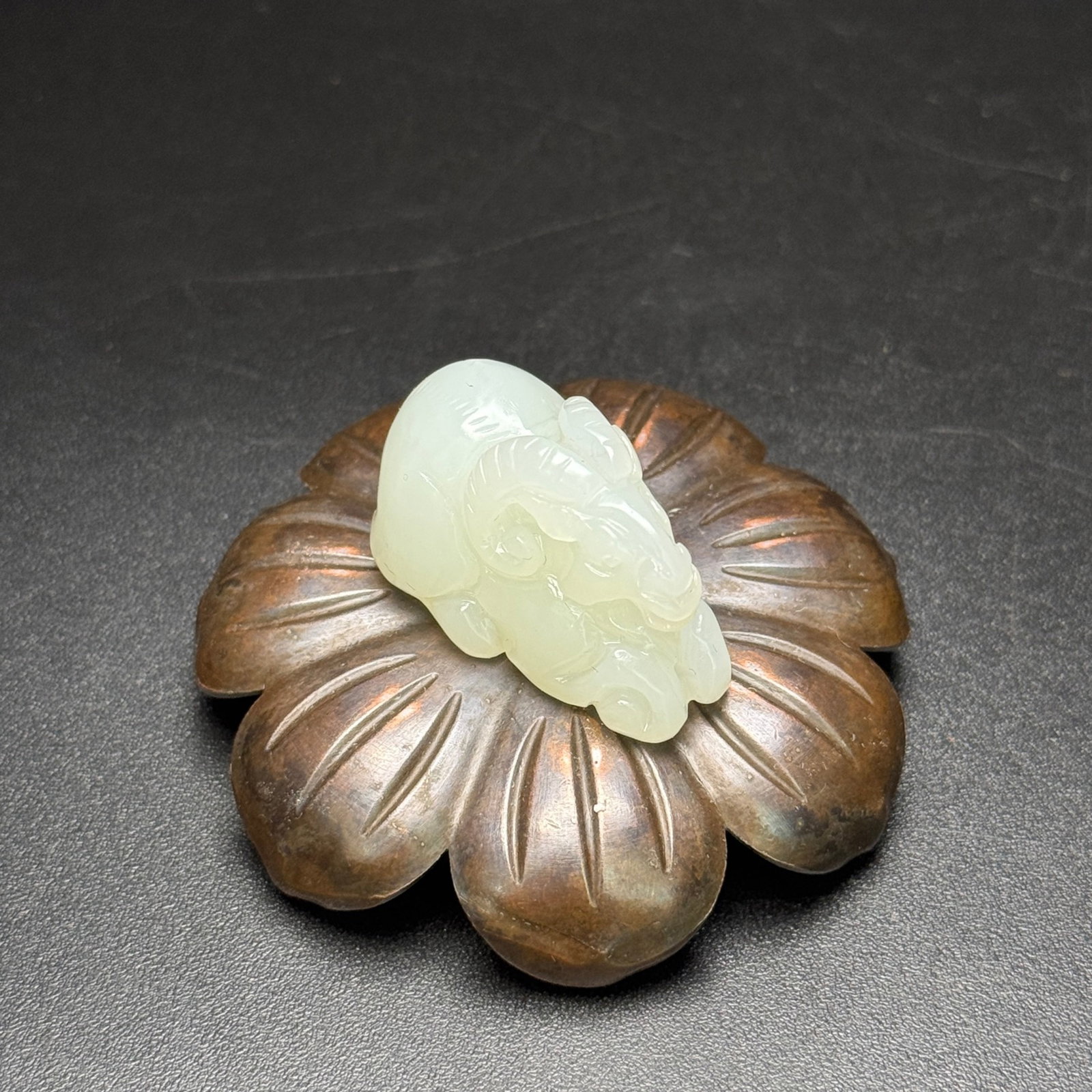 An Exquisite White Jade Sheep Pendant: An Exquisite White Jade Sheep Pendant,Qing Dynasty,China,Size:35mmx21mmx21mm,Weight:19g 白玉羊挂件,中国清代