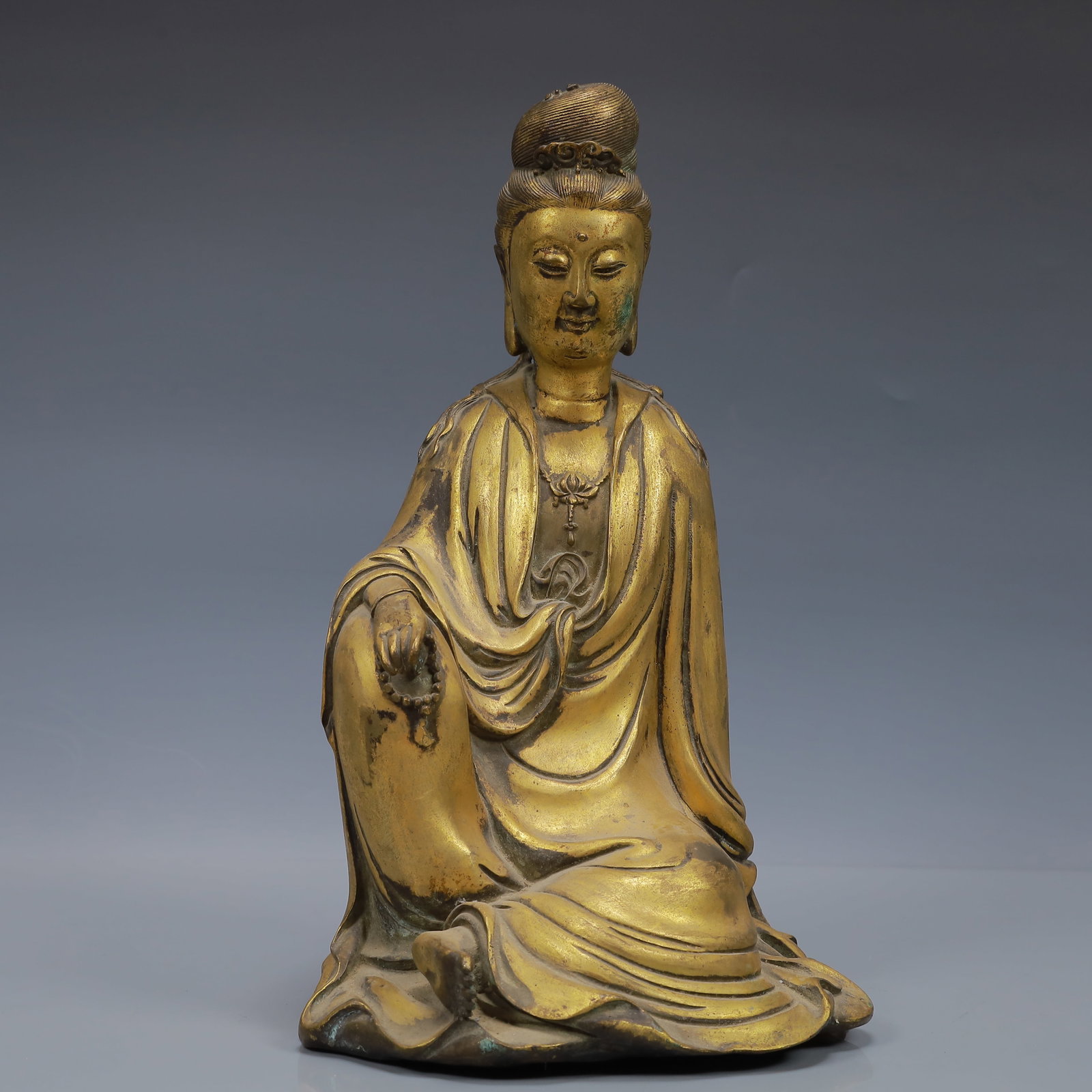 A Rare Statue of Avalokitesvara: A Rare Statue of Avalokitesvara,Ming Dynasty, China,Xuande Six-character Mark,Size:7.1inx6.3inx11.8in,Weight:6000g 铜鎏金观音像,中国明代,
