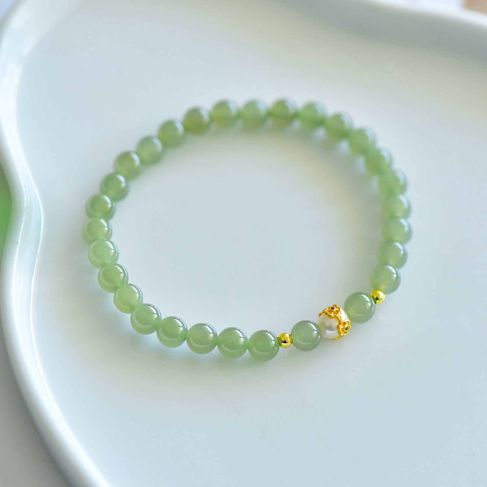 An Exquisite Greenish Jade Bracelets (1 of 5)