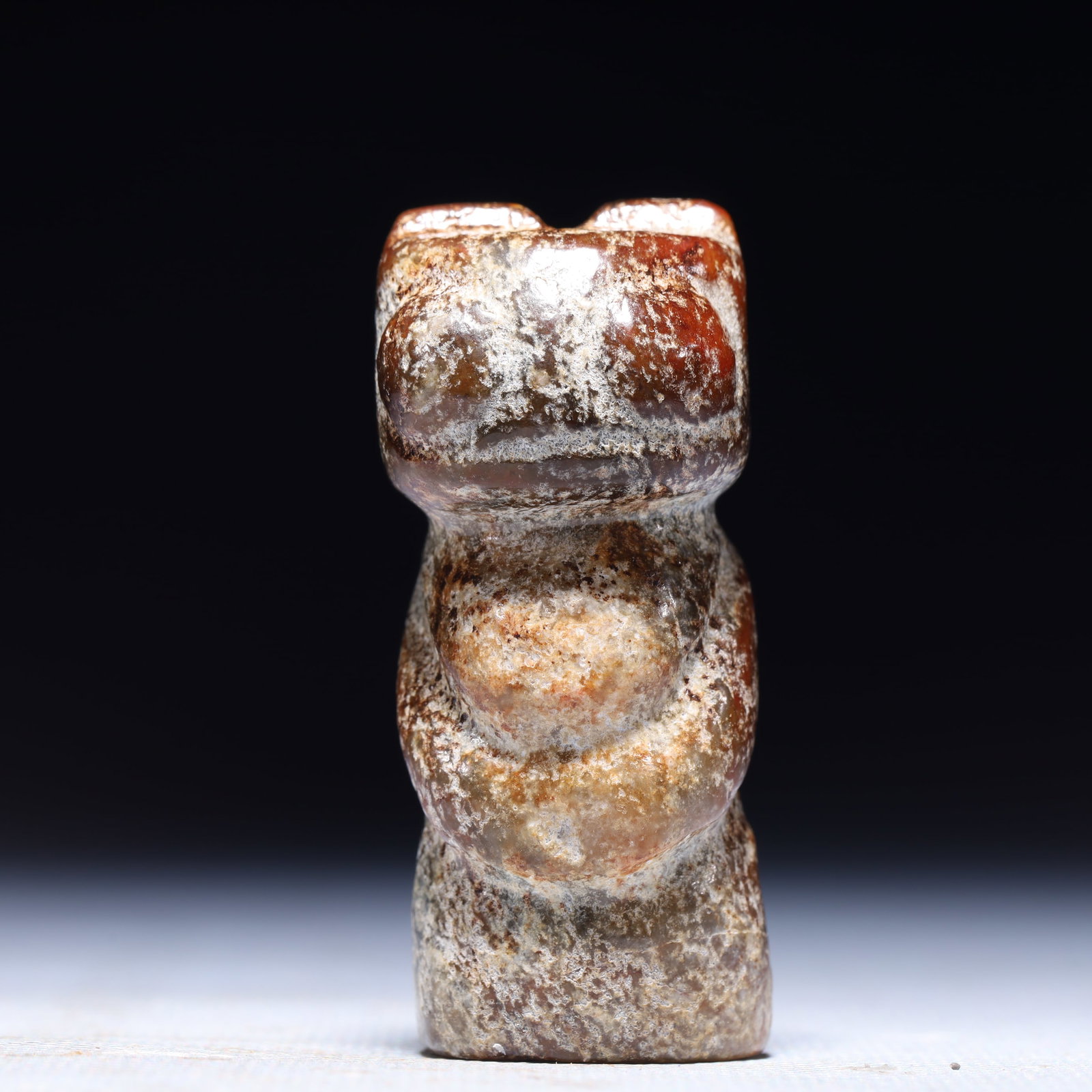An Archaic Hongshan Culture Yellow Jade Figure Ornament: An Archaic Hongshan Culture Yellow Jade Figure Ornament,Ancient Time,China,Size:1inx0.8inx2.4in,Weight:76g 红山文化黄玉人物摆件,中