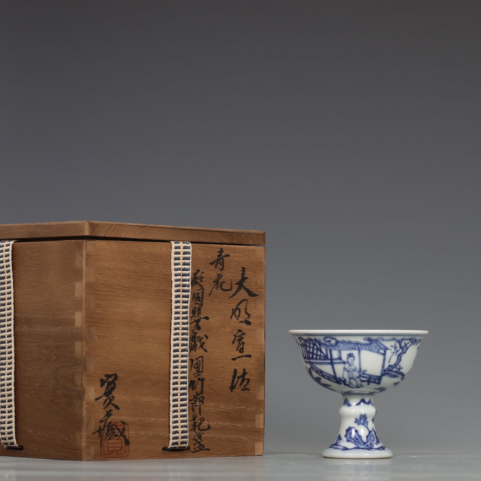 An Exquisite Blue and White Character and Story Pattern Stem Cup,With Sanskrit: An Exquisite Blue and White Character and Story Pattern Stem Cup,With Sanskrit,Ming Dynasty,China,Xuande Six-character Mark,Size:3inx3.1in 青花人物故事纹ƌ