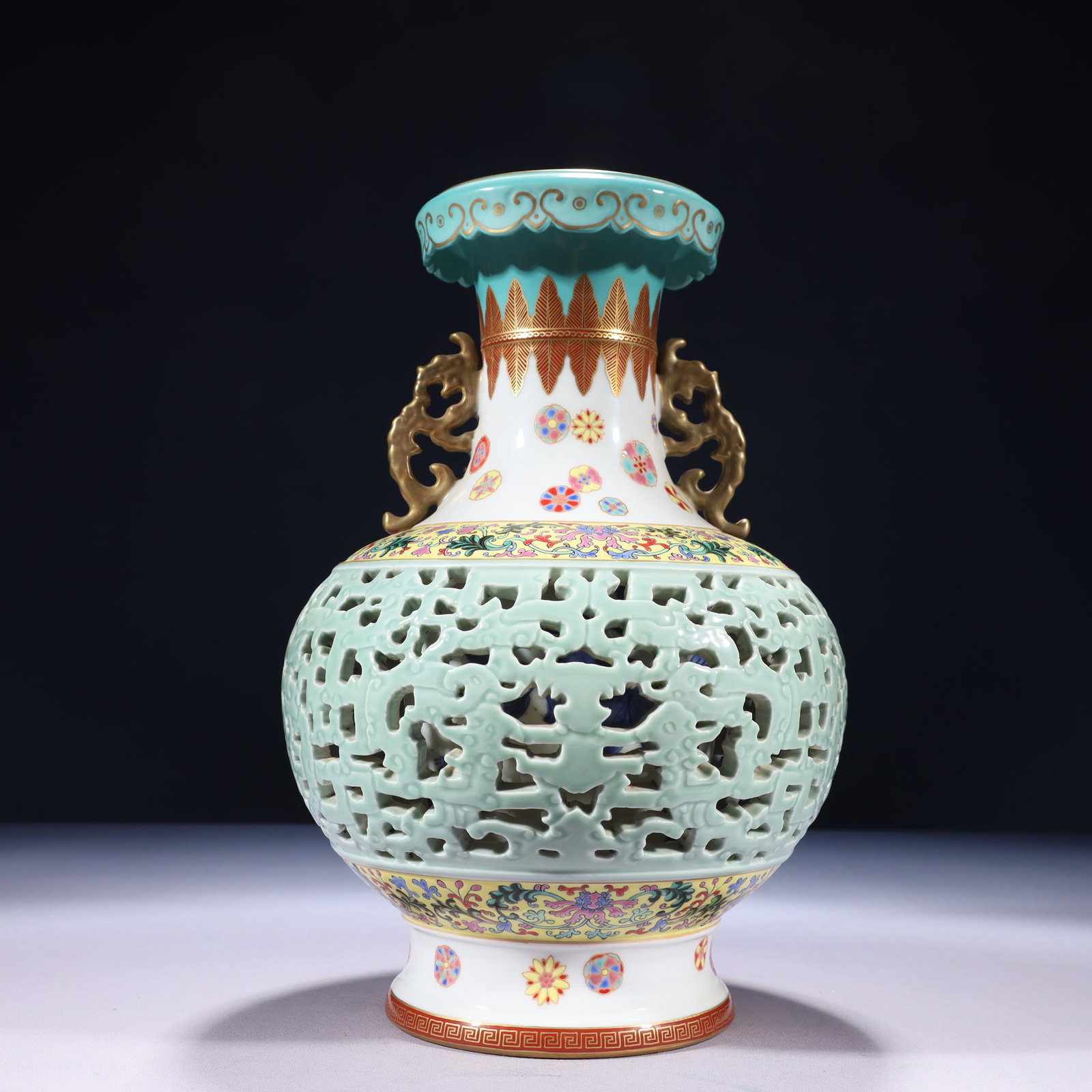 An Exquisite Celadon Glazed Famille-Rose Painted Gold Lotus Pattern Double-Ears Vase: An Exquisite Celadon Glazed Famille-Rose Painted Gold Lotus Pattern Double-Ears Vase,Qing Dynasty,China,Yongzheng Four-character Mark,Size:7.5inx12.6in,Weight:3050g 青釉粉彩