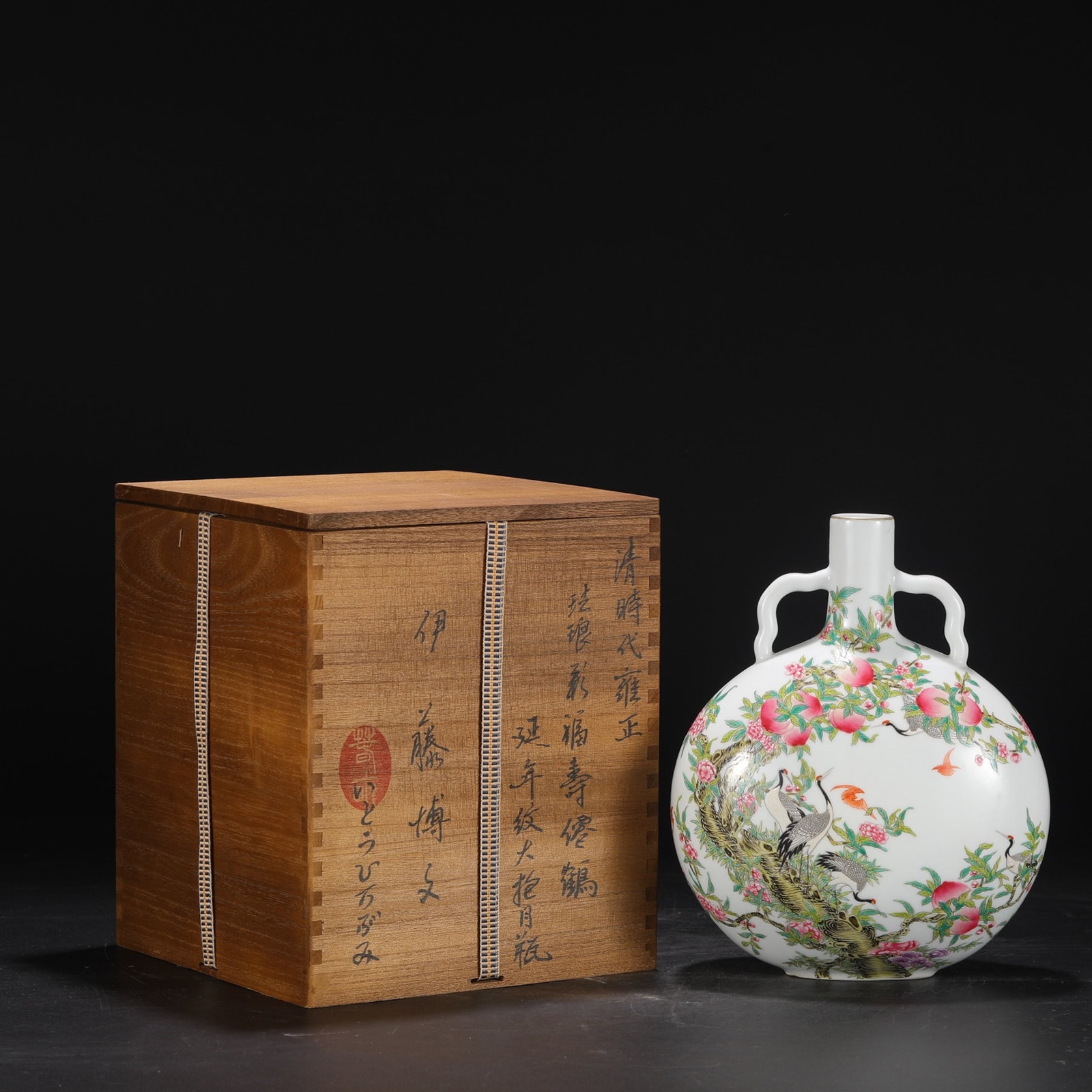 An Exquisite Enamel Pine and Crane Pattern Double-Ears Vase,with poem: An Exquisite Enamel Pine and Crane Pattern Double-Ears Vase,with poem,Qing Dynasty,China,Yongzheng Four-character Mark,Size:10.8inx8.1in 珐琅彩松鹤纹双耳